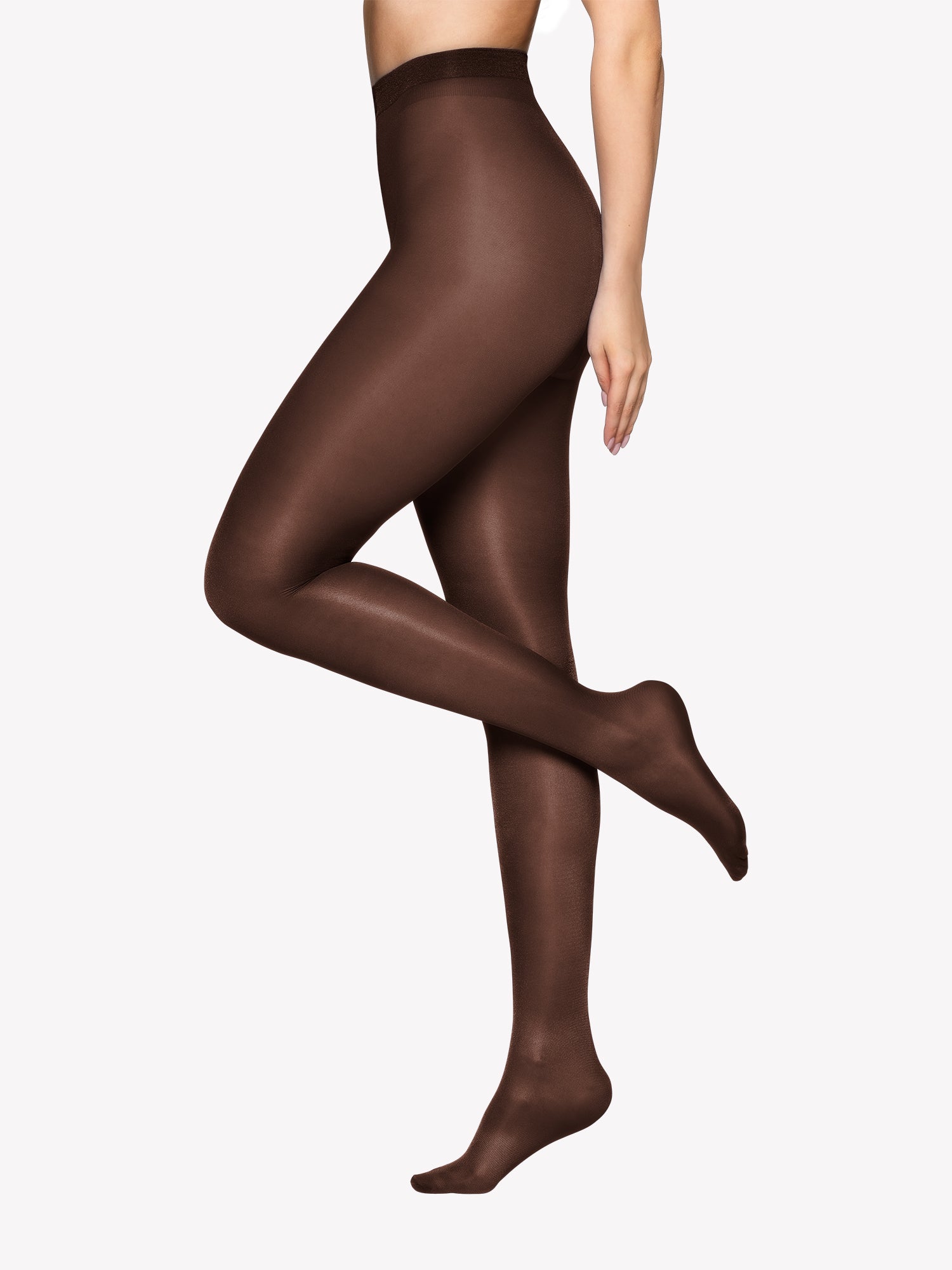 Vogue women's shiny semi-opaque tights in cocoa are perfect for adding a touch of elegance to your wardrobe. On a model pictured from the side.