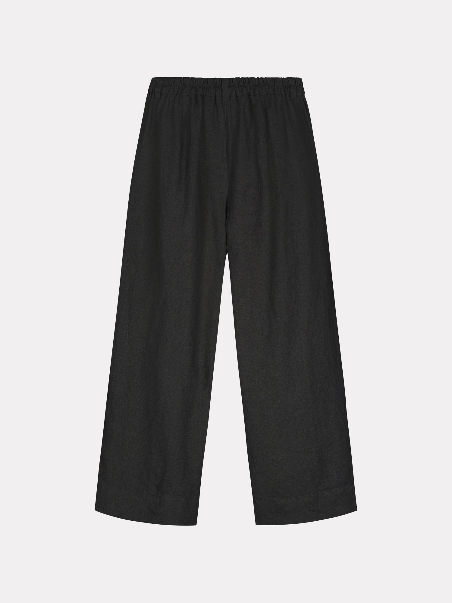 Saari linen culottes trousers in a lovely black shade for women with an elastic waistband and 7/8 length. These versatile pants are a staple for all seasons, perfect for both casual and formal occasions. Displayed as a flatlay.