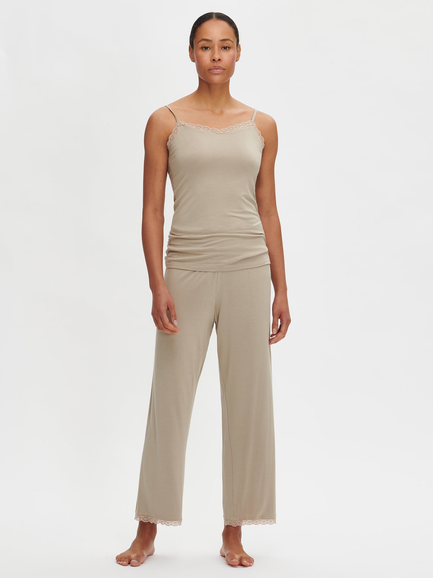 Nanson women's luxuriously soft brown Pitsi top with spaghetti straps, worn by the model with the matching Pitsi pants from the same collection.