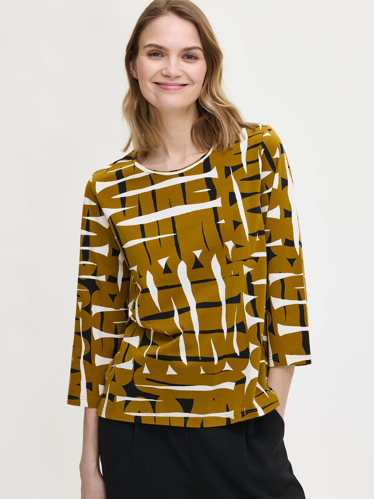 Nanso women's brown Kaiku blouse features a patterned design with a round neckline, front
