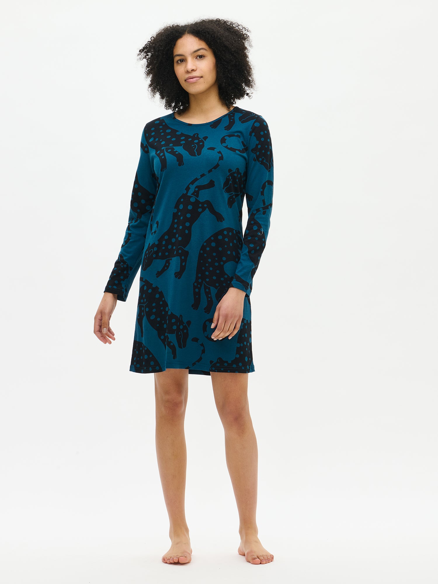 Nanso women’s blue Leonora nightgown with long sleeves and round neckline, worn by model from the front. Hemline falls above the knees.