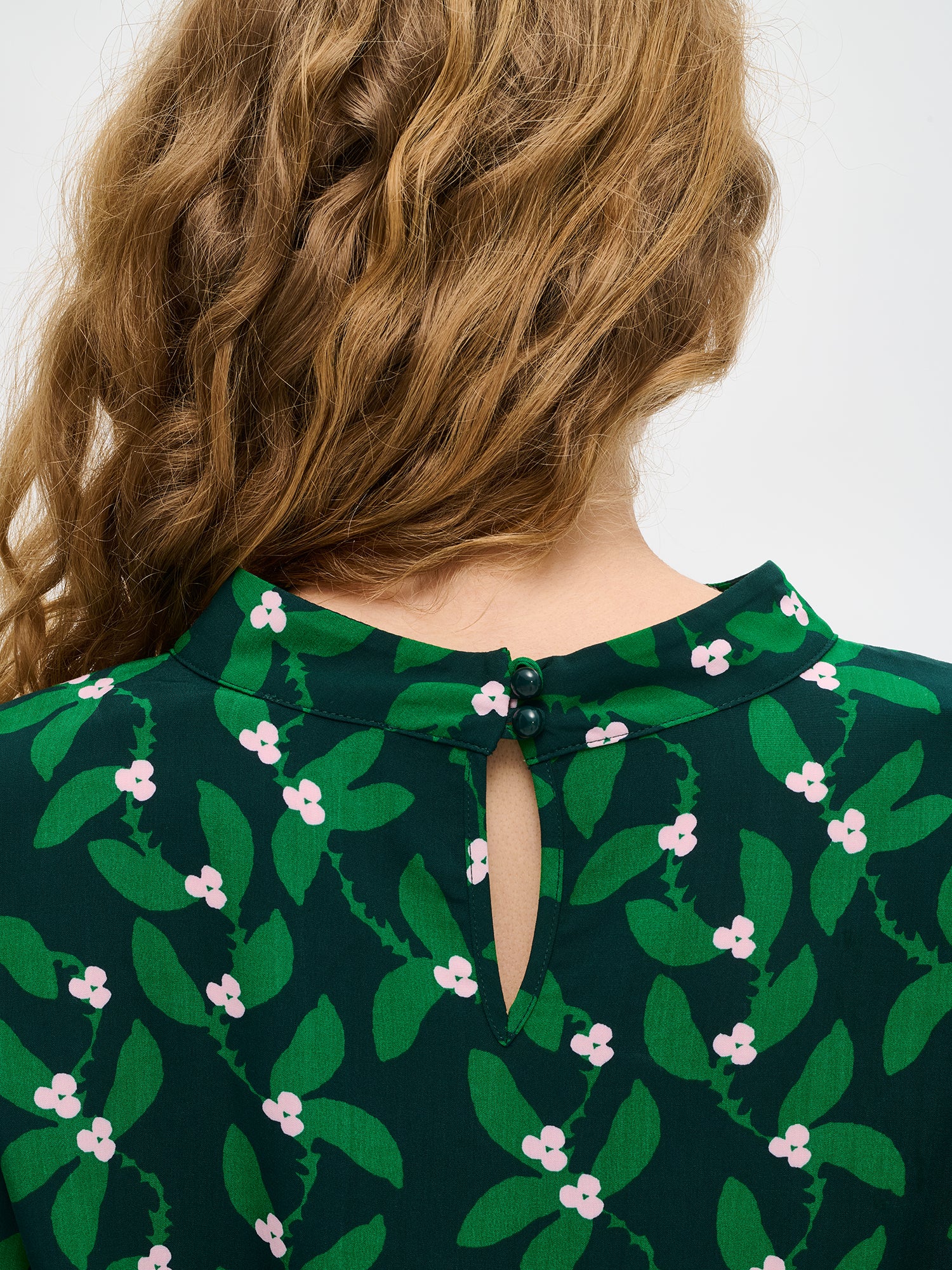 Nanso women’s Vieno blouse in soft viscose with green floral print, back