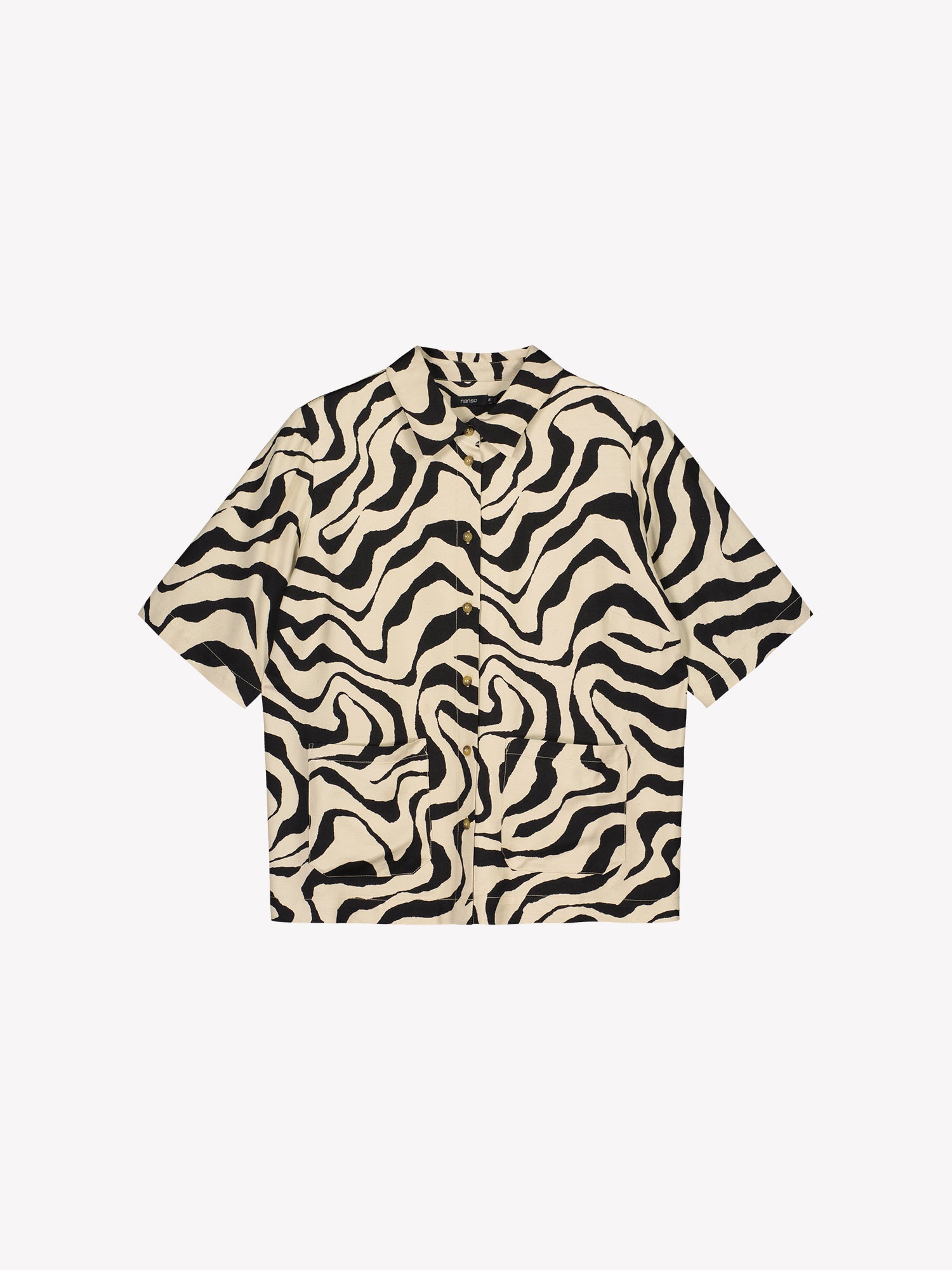 Nanso's Savanna shirt in beige for women features a stylish pattern and short sleeves