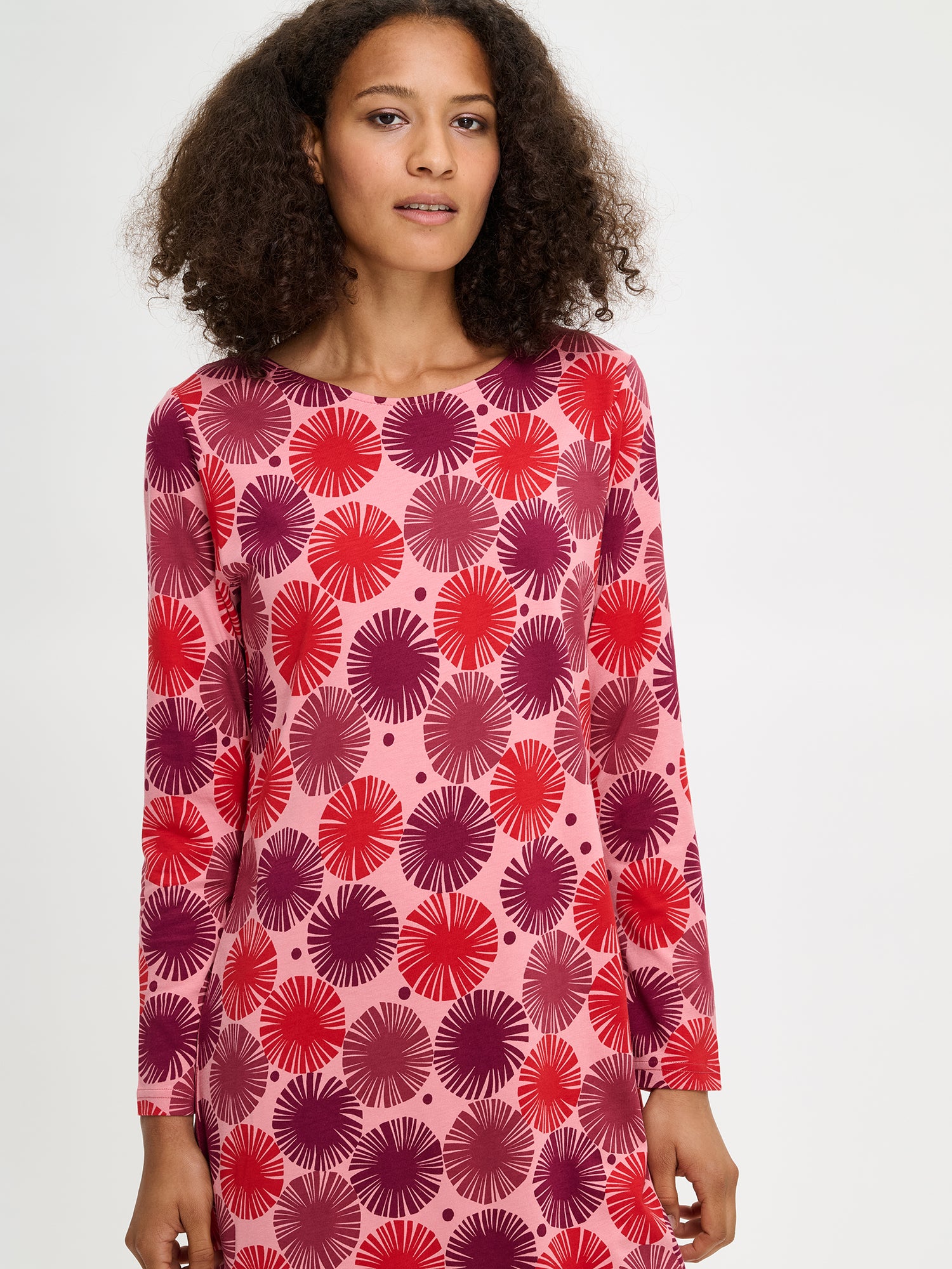 Nanso Amara red women’s patterned cotton-modal nightgown with long sleeves, half-body image worn by model.