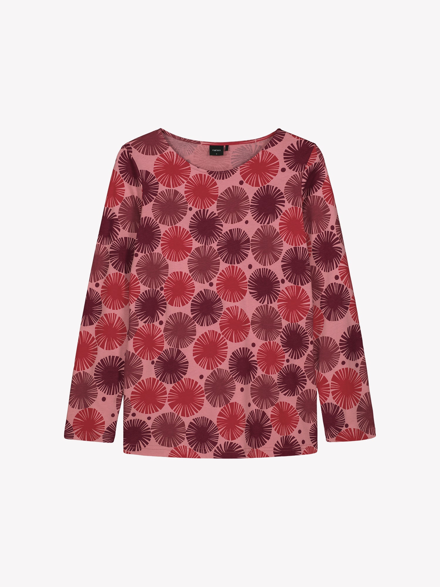 Nanso Amara red women’s pajama top with long sleeves and oval neckline, graphic print, product photo.