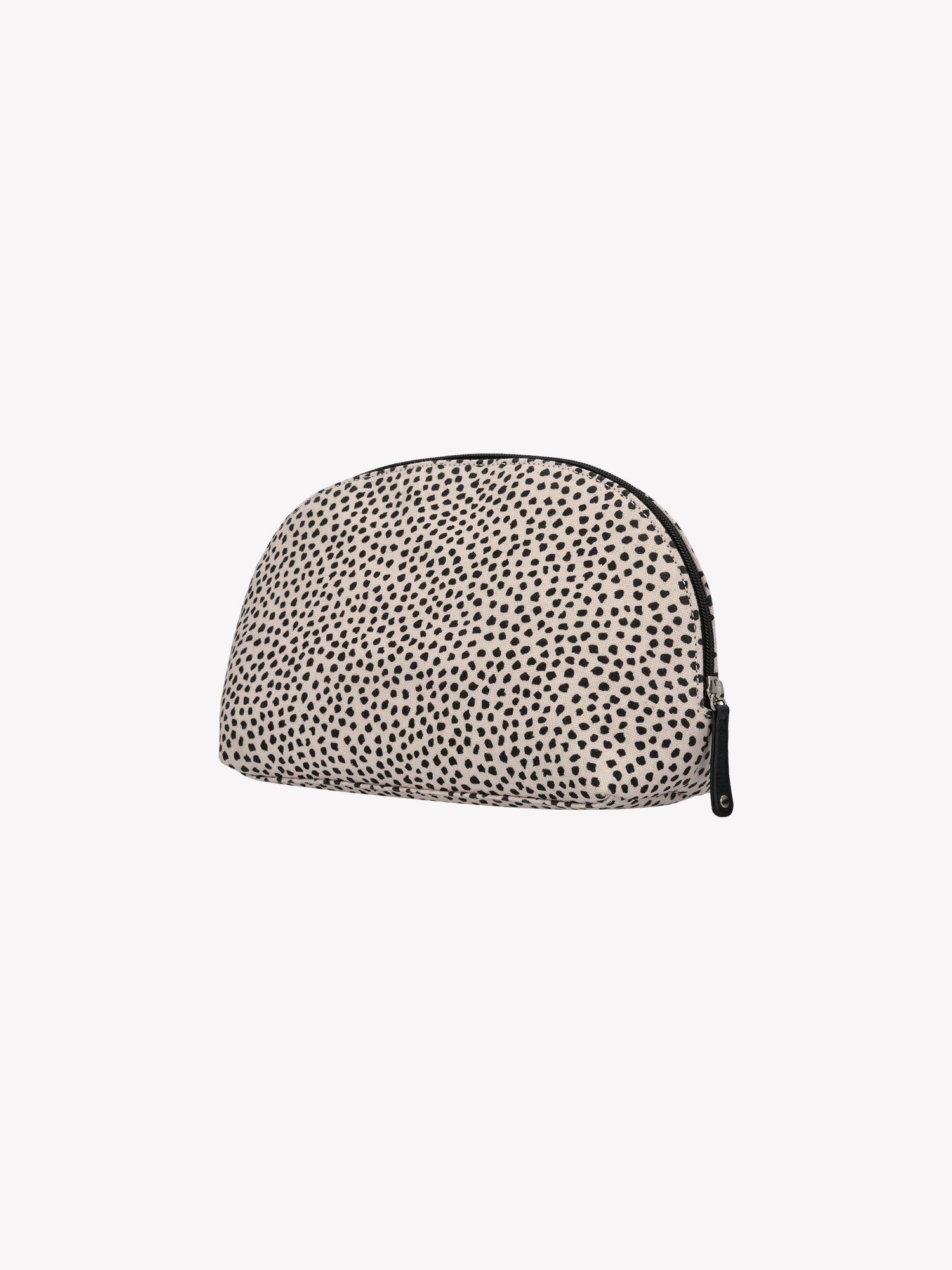 Nanso's beige Muru cosmetics bag features a charming delicate polka dot pattern from the back