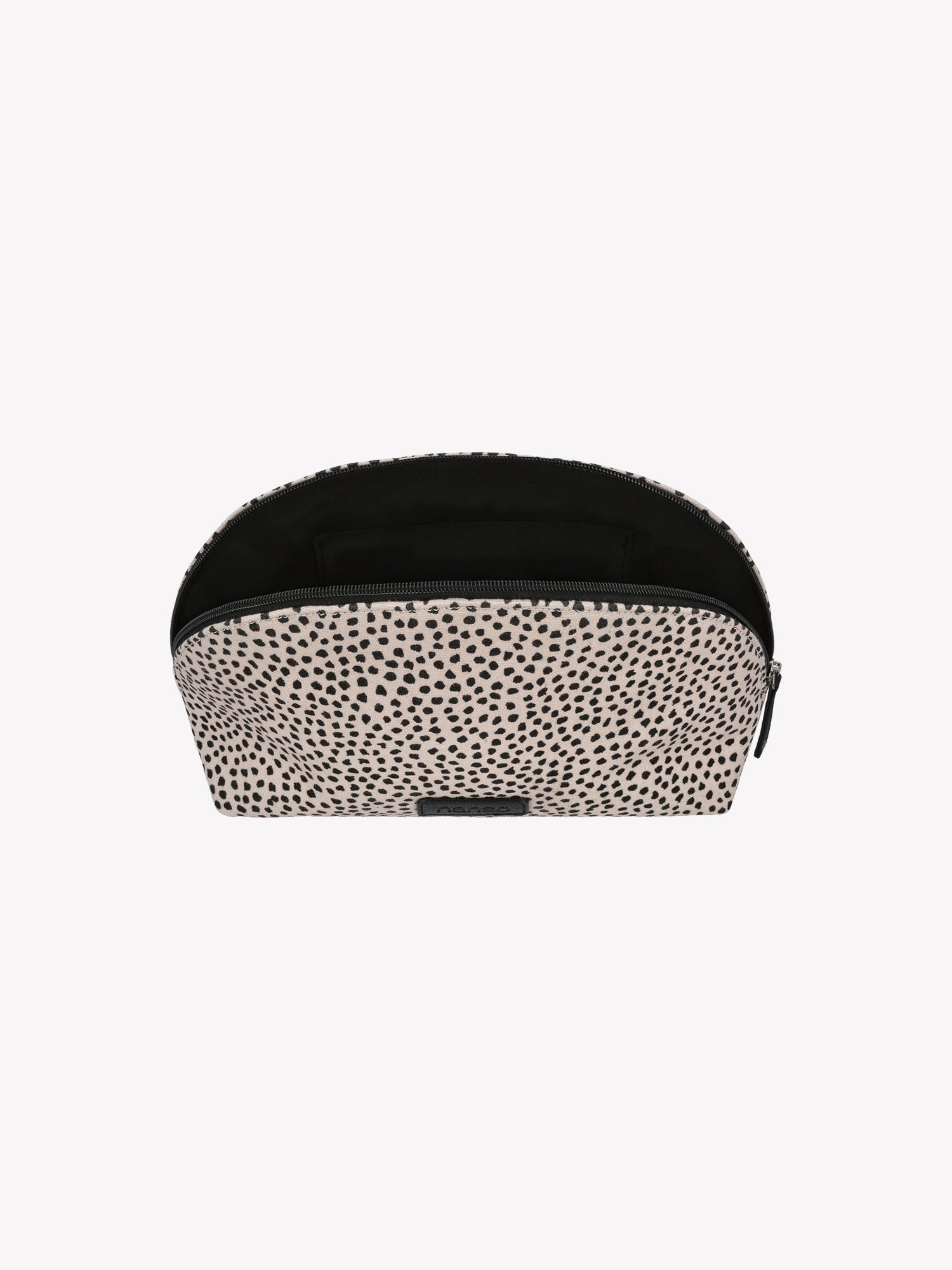 Nanso's beige Muru cosmetics bag features a charming delicate polka dot pattern open