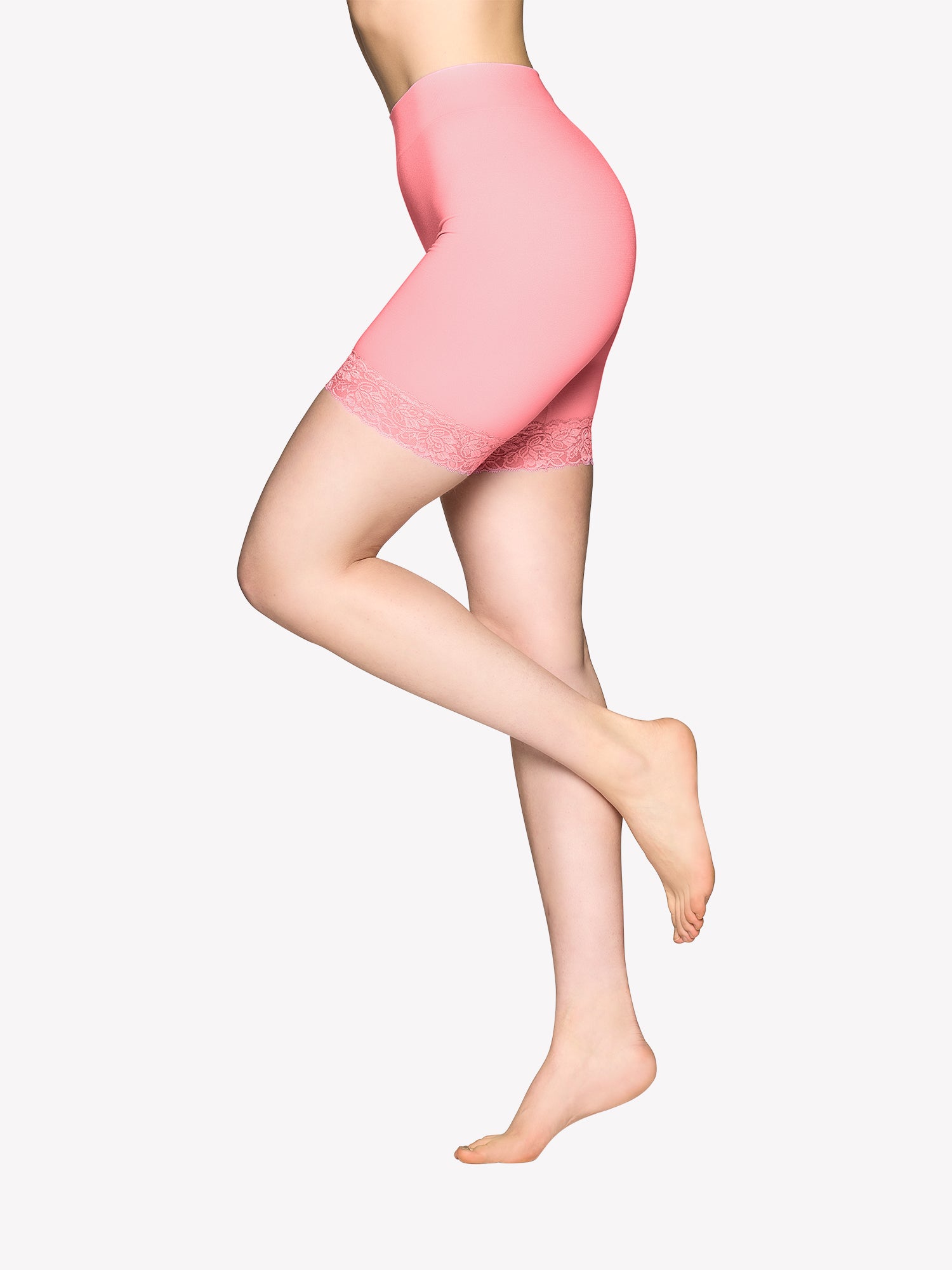 Seamless Short Leggings in Pink Icing with beautiful lace details. The delicate lace detailing adds a touch of elegance.