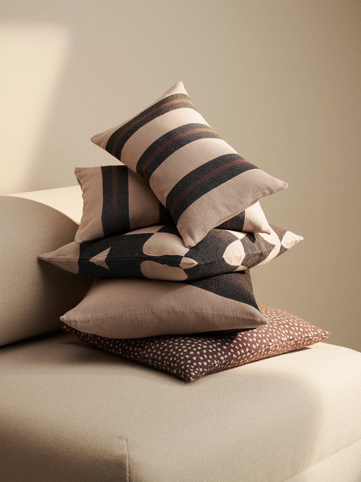 Nanso home textiles in brown, in a stylish home decor picture.