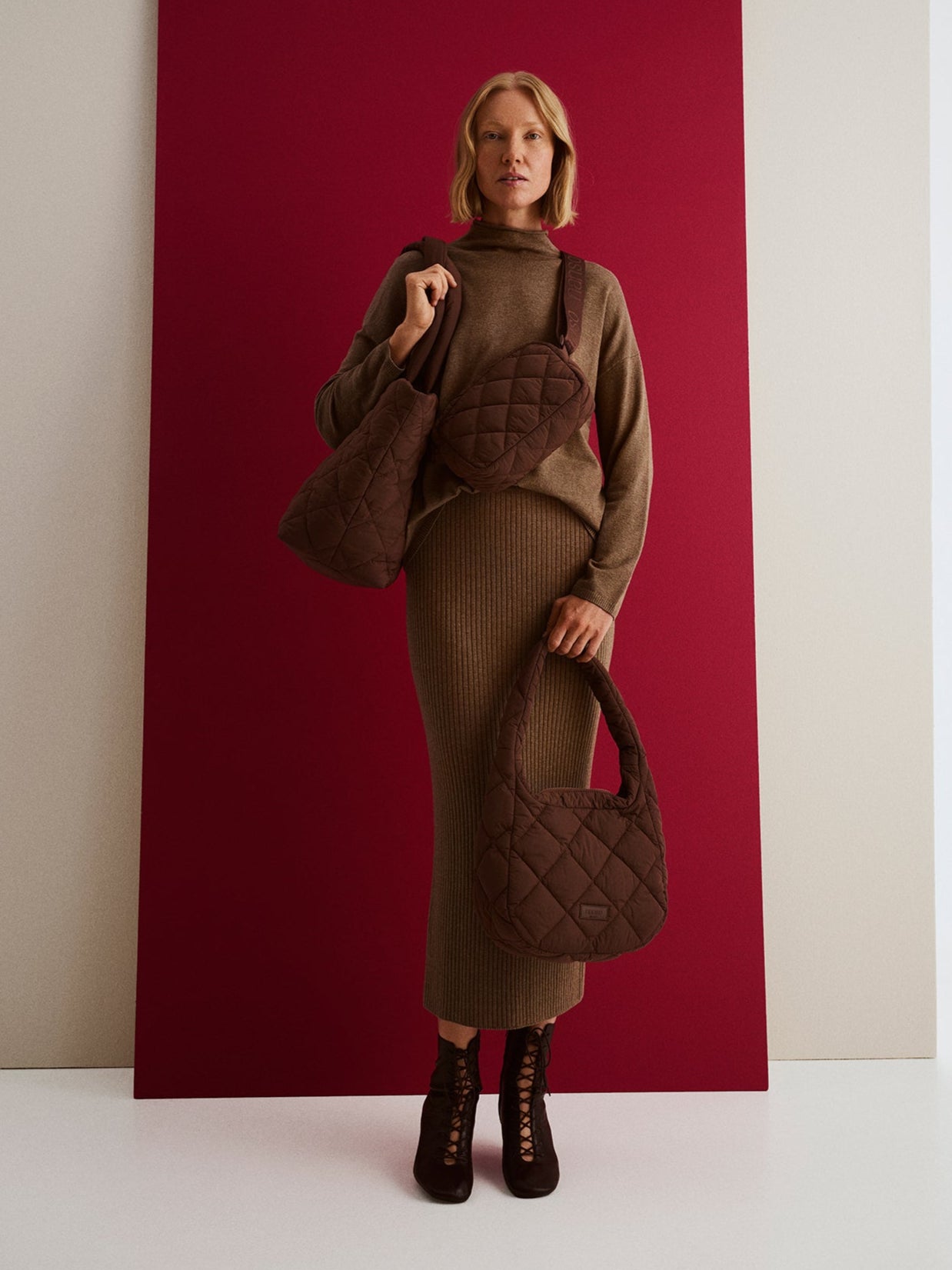 Nanso women's brown vanu bags, carried by a model.