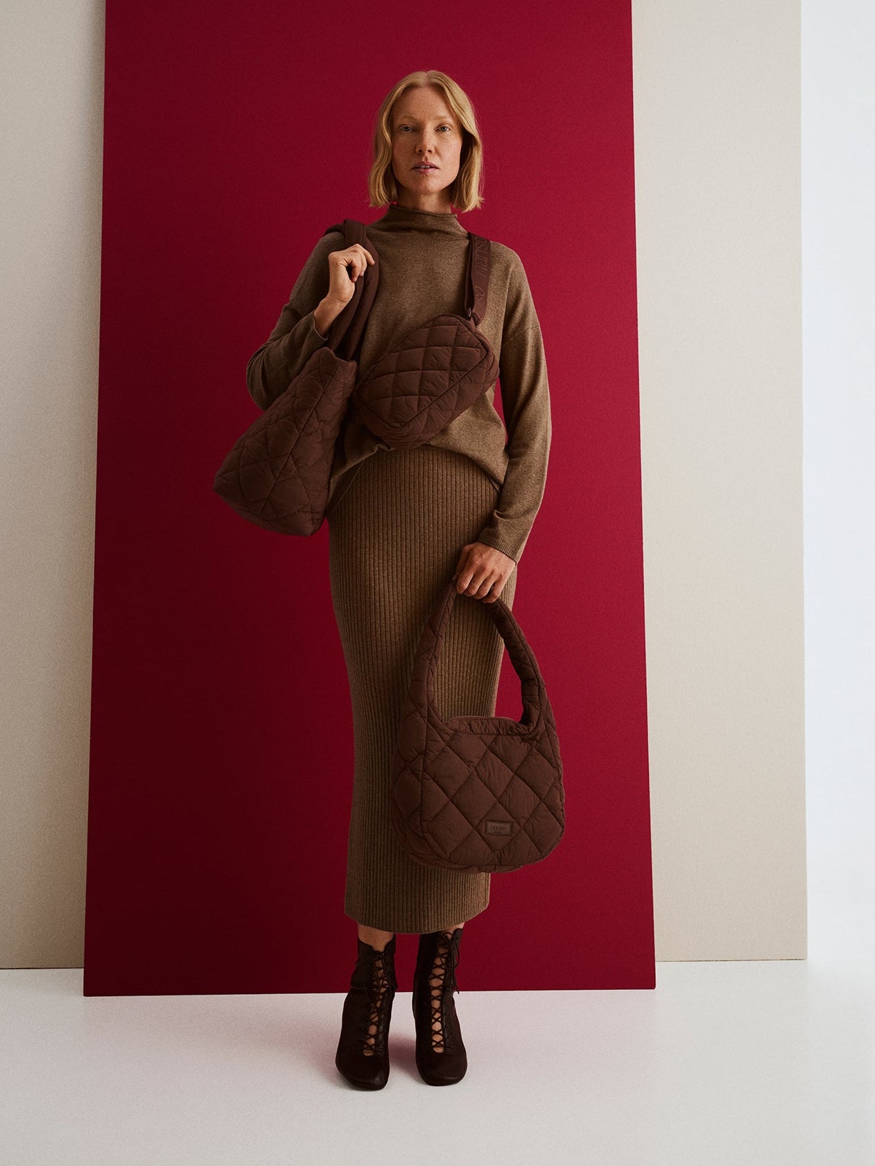 Nanso women's brown vanu bags, carried by a model