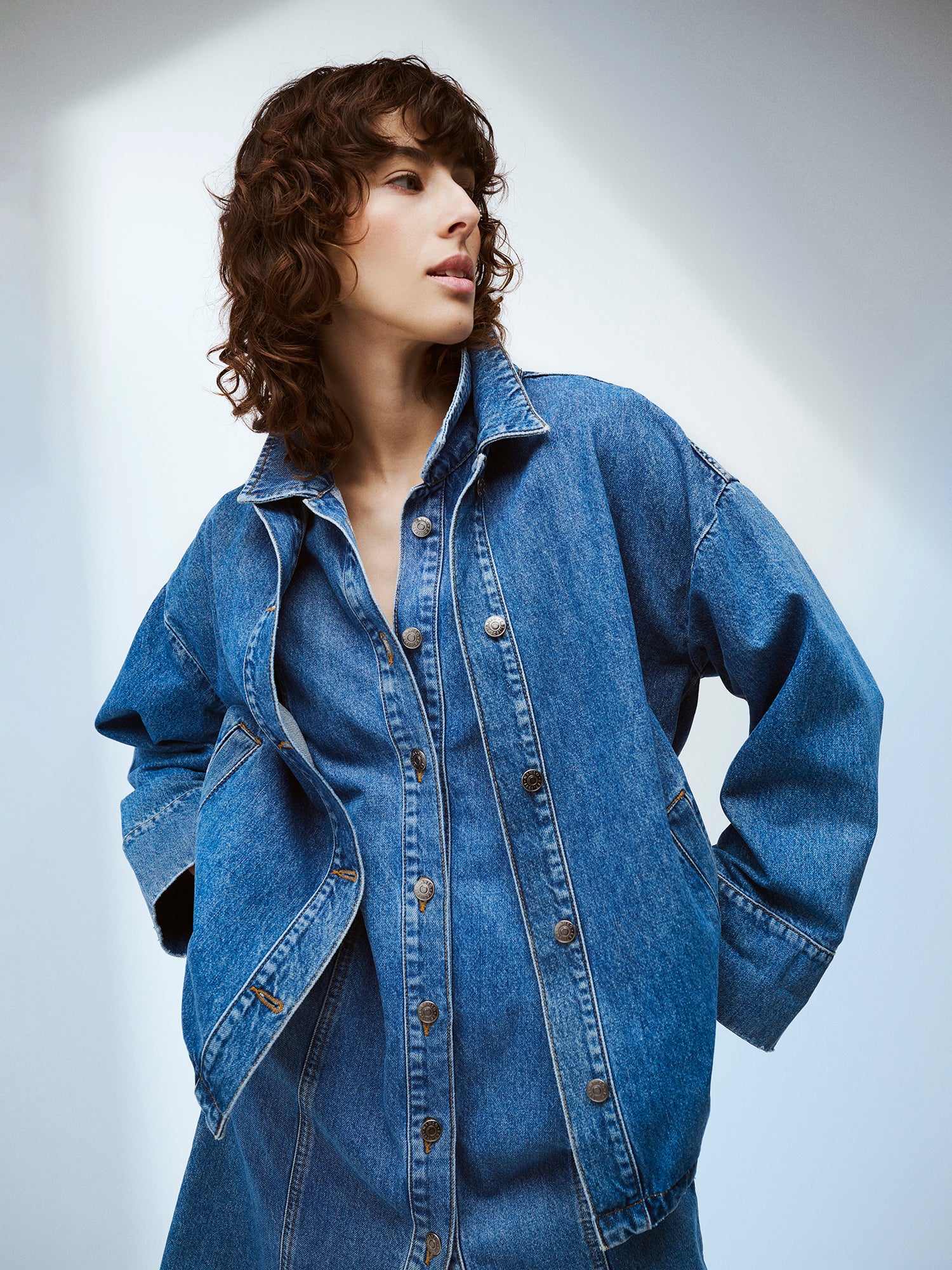 Nanso women's Doris denim dress and Doris Denim jacket on a model close-up.