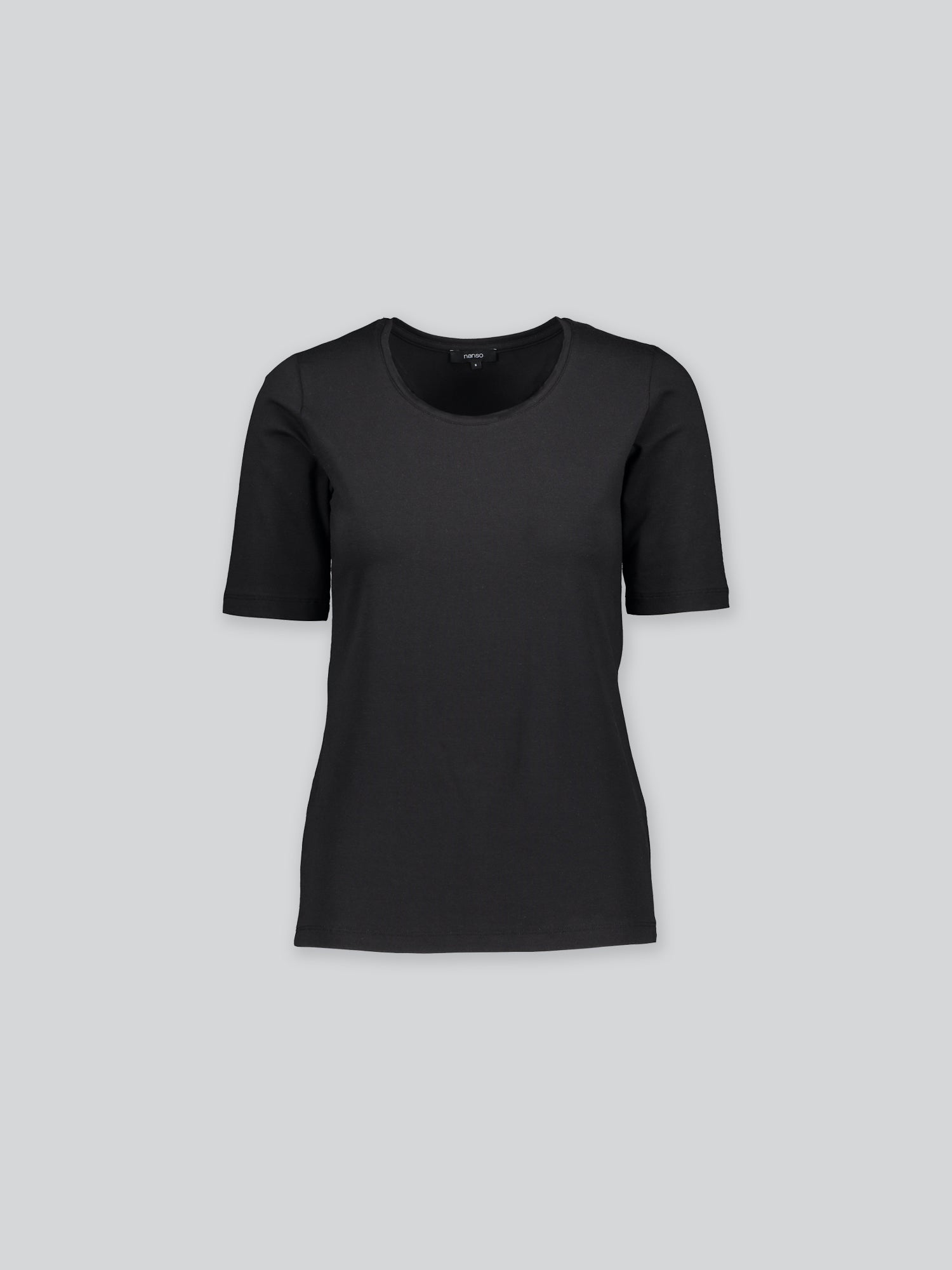 This versatile and stylish women's BASIC T-shirt in black is perfect for everyday wear. Its simple yet timeless design is suitable for any occasion.