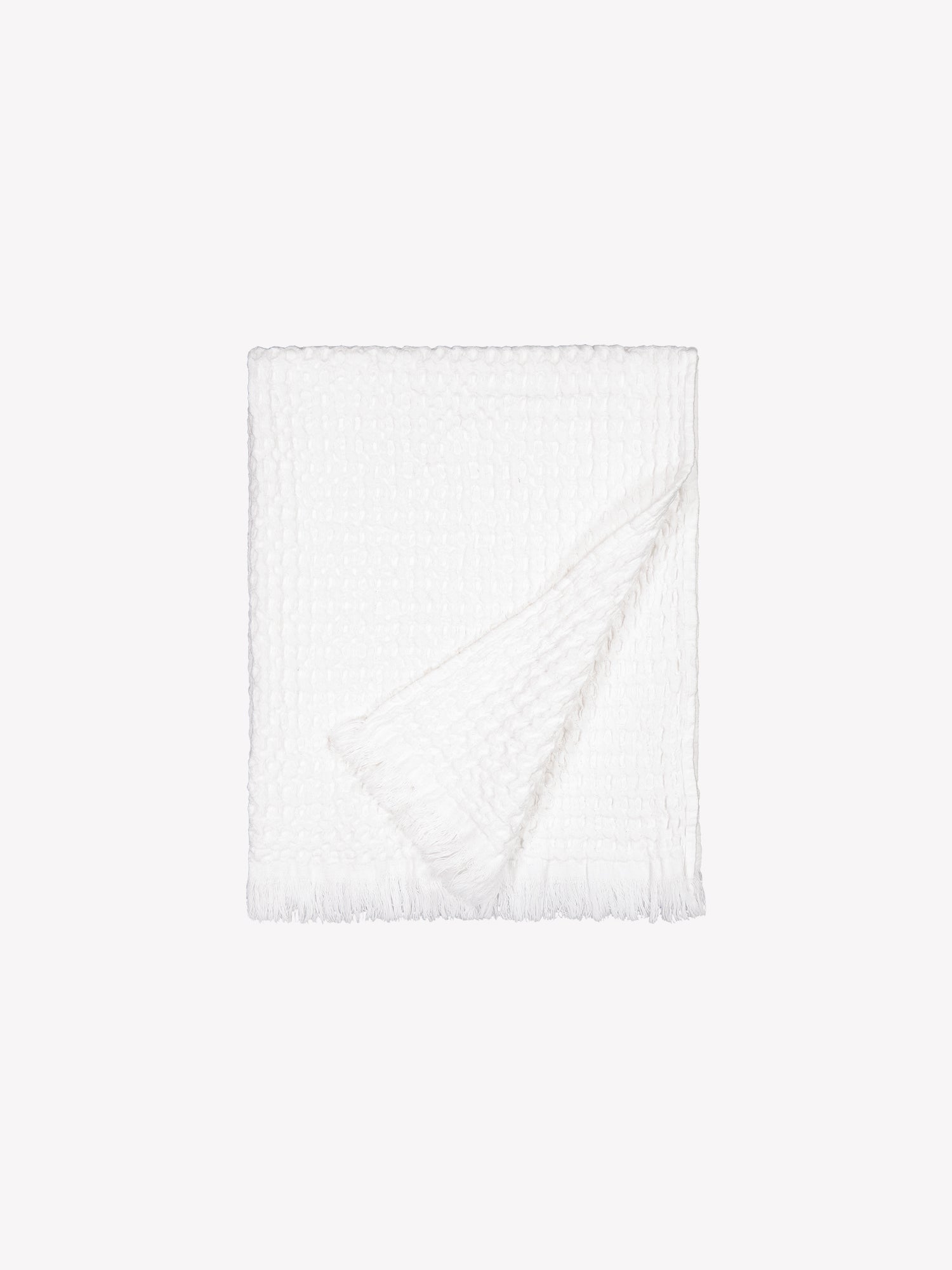 Vohveli hand towel in beautiful white folded