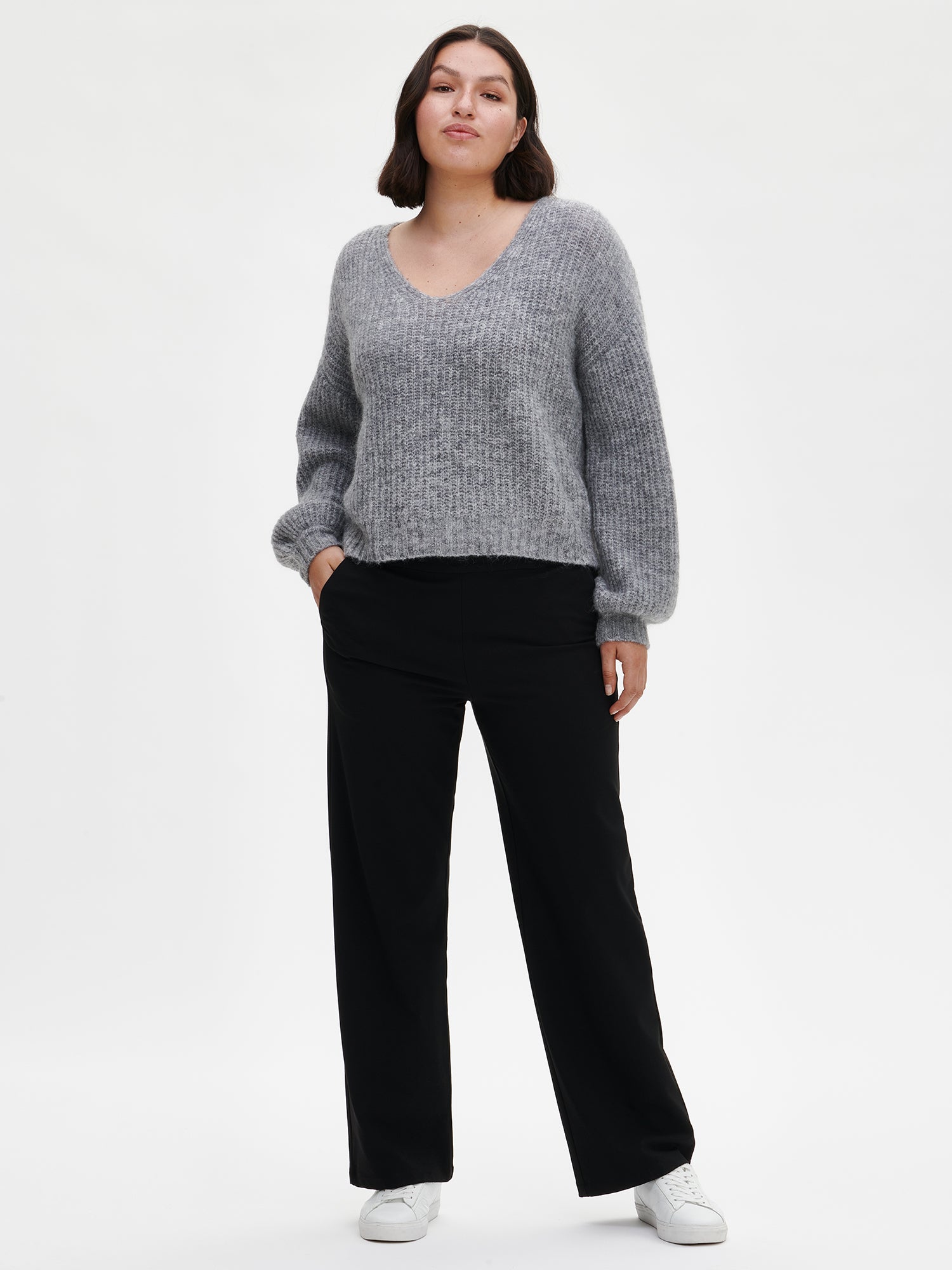 Nanso Women's Jonna black trousers, on a model from front.