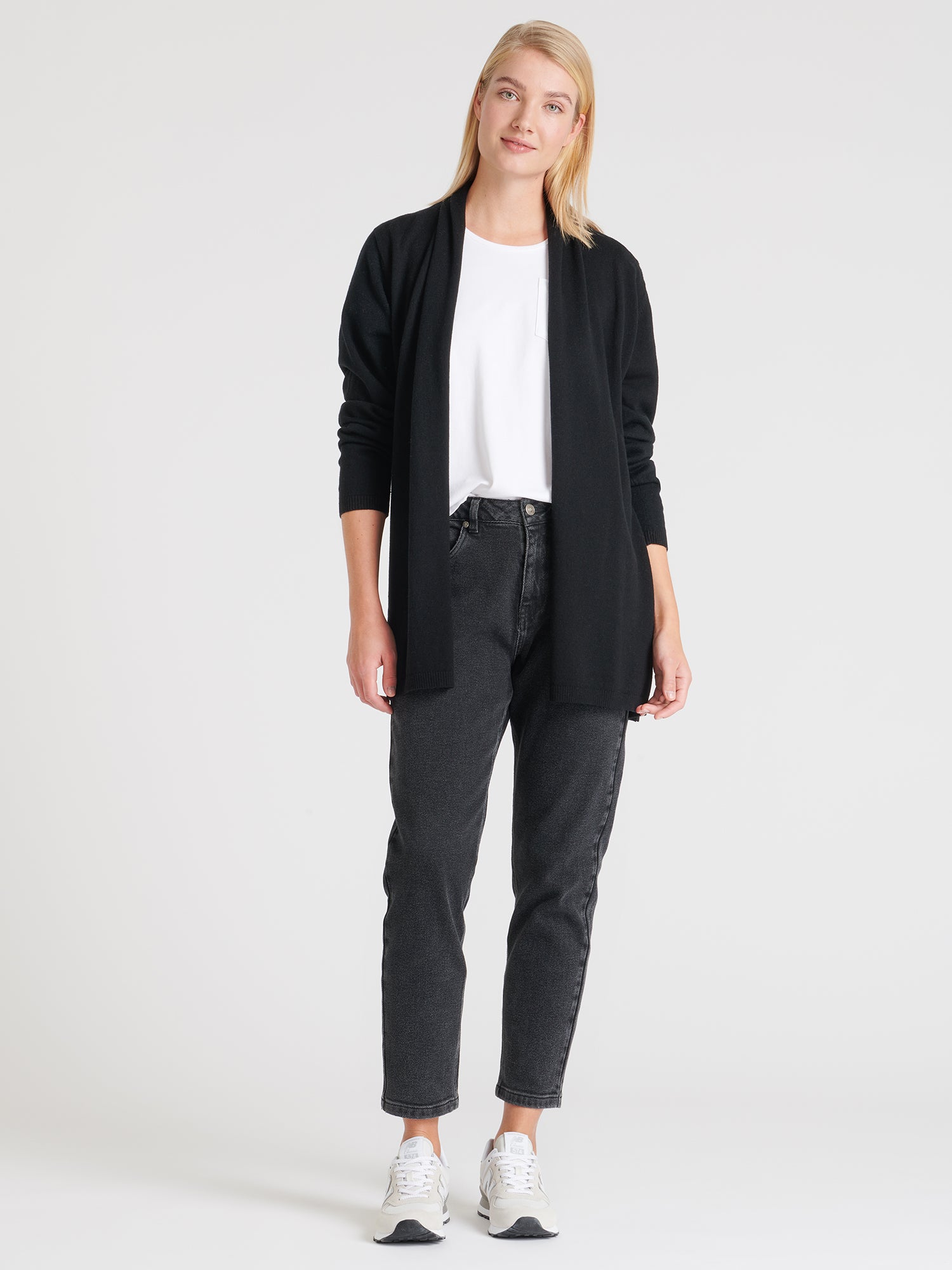 Nanso women's classic knitted Villis cardigan in a fine, luxurious merino wool and cotton blend, on a model from the front.