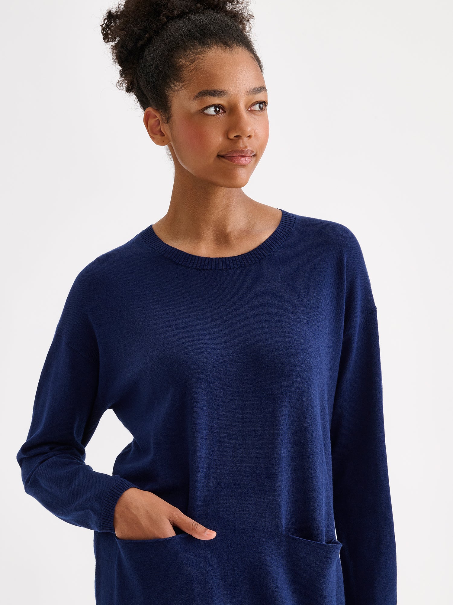 Nanso women's elegantly simple Villis knit tunic on a model.