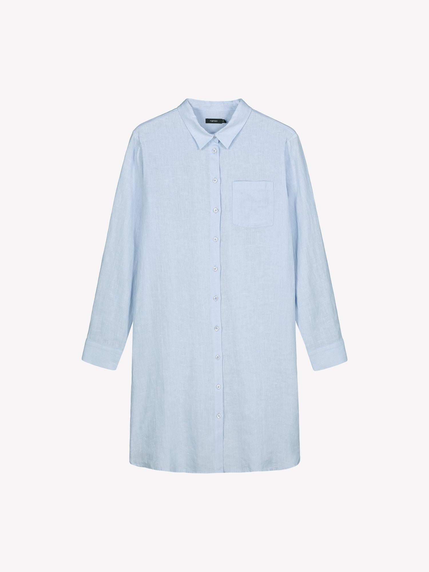 Nanso's long PELLAVA shirt in light blue in a product picture.