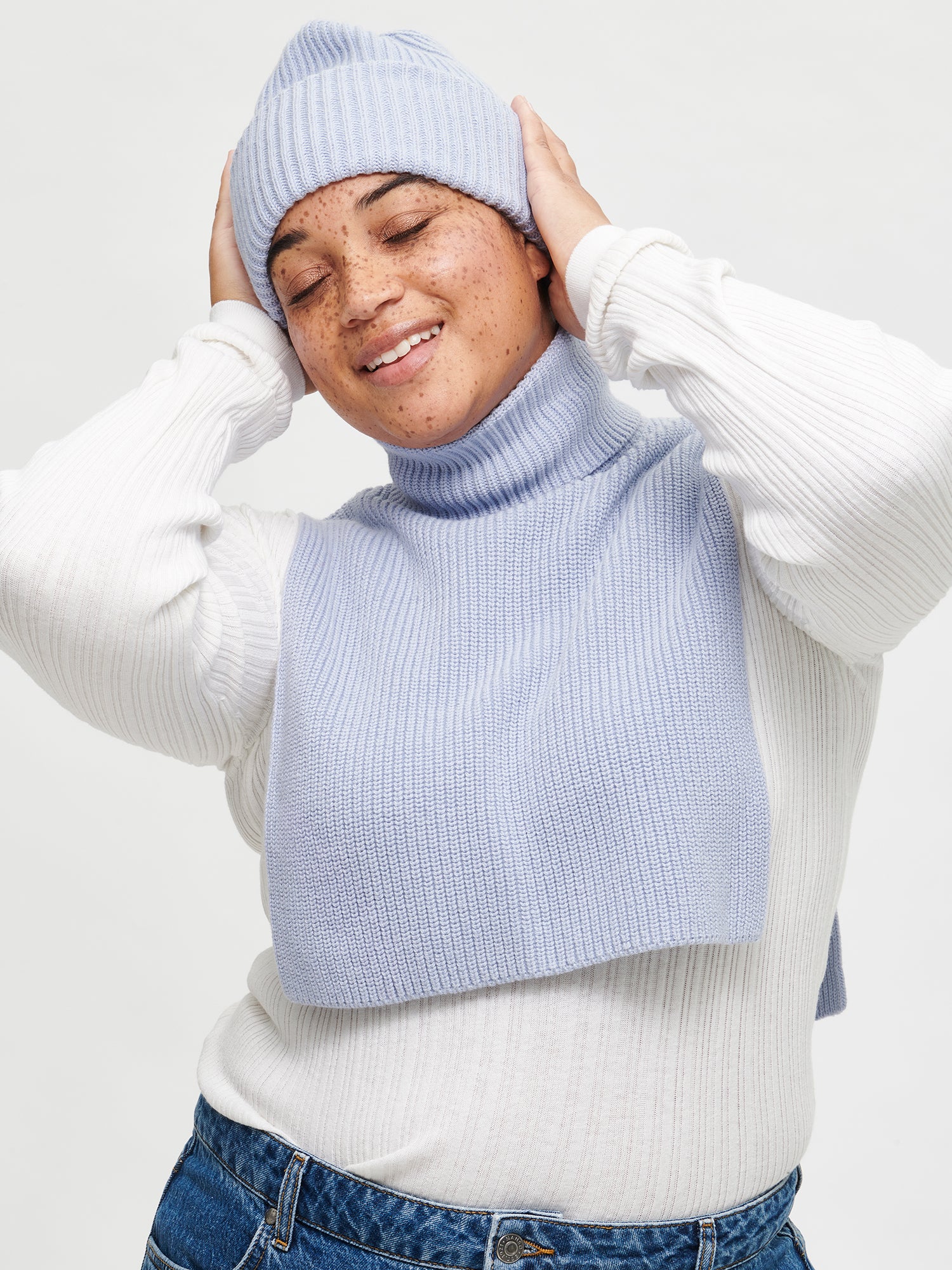 Nanso women's  blue Utu beanie features a patent knit. 