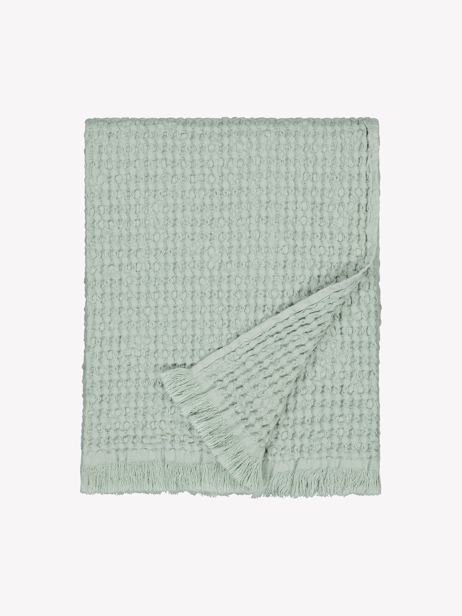 Nanso home's Vohveli Bath towel in light green in a product picture