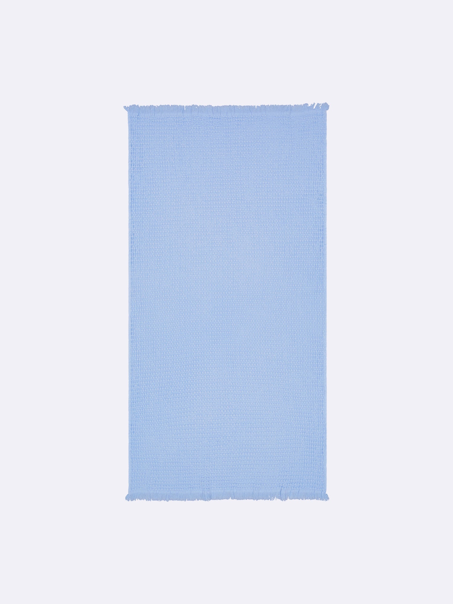 Nanso home's Vohveli Bath towel in light blue offers a wonderful blend of classic waffle fabric and contemporary design. 