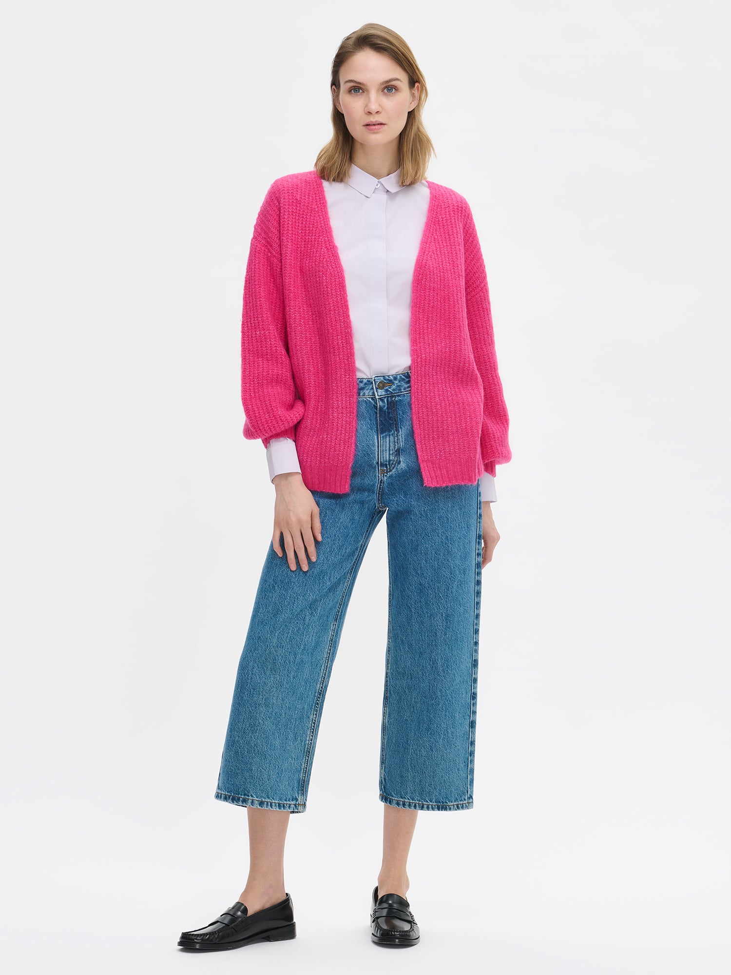 Nanso's women's luxurious pink knit Karamelli cardigan, from the front.