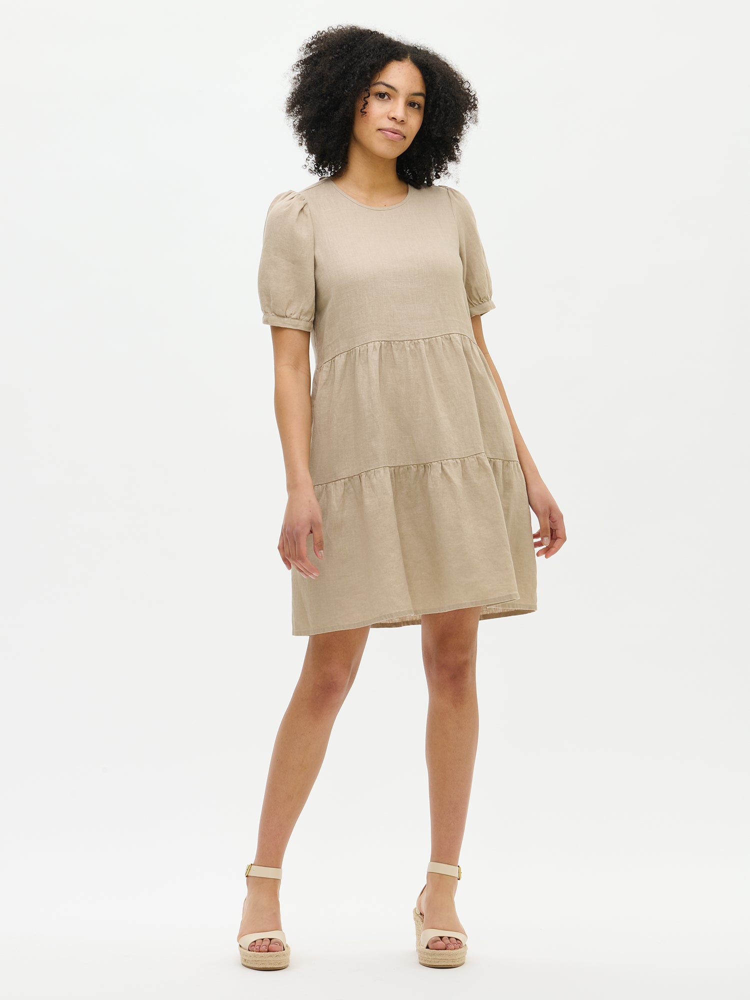 Nanso women's beautiful beige Sarastus linen dress with voluminous frill layers and short puff sleeves from the front