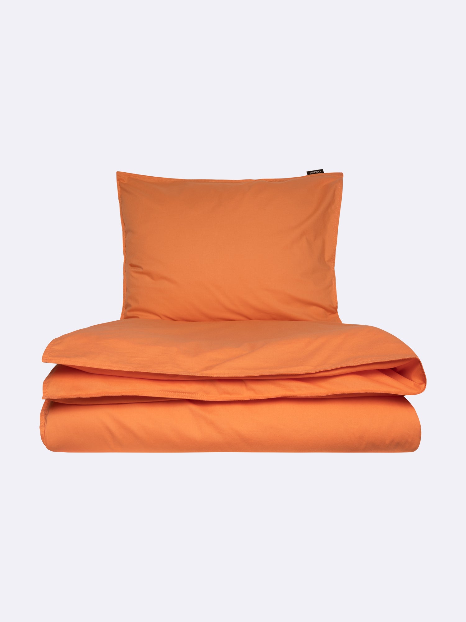 Nanso home's UNI duvet cover in orange closed.