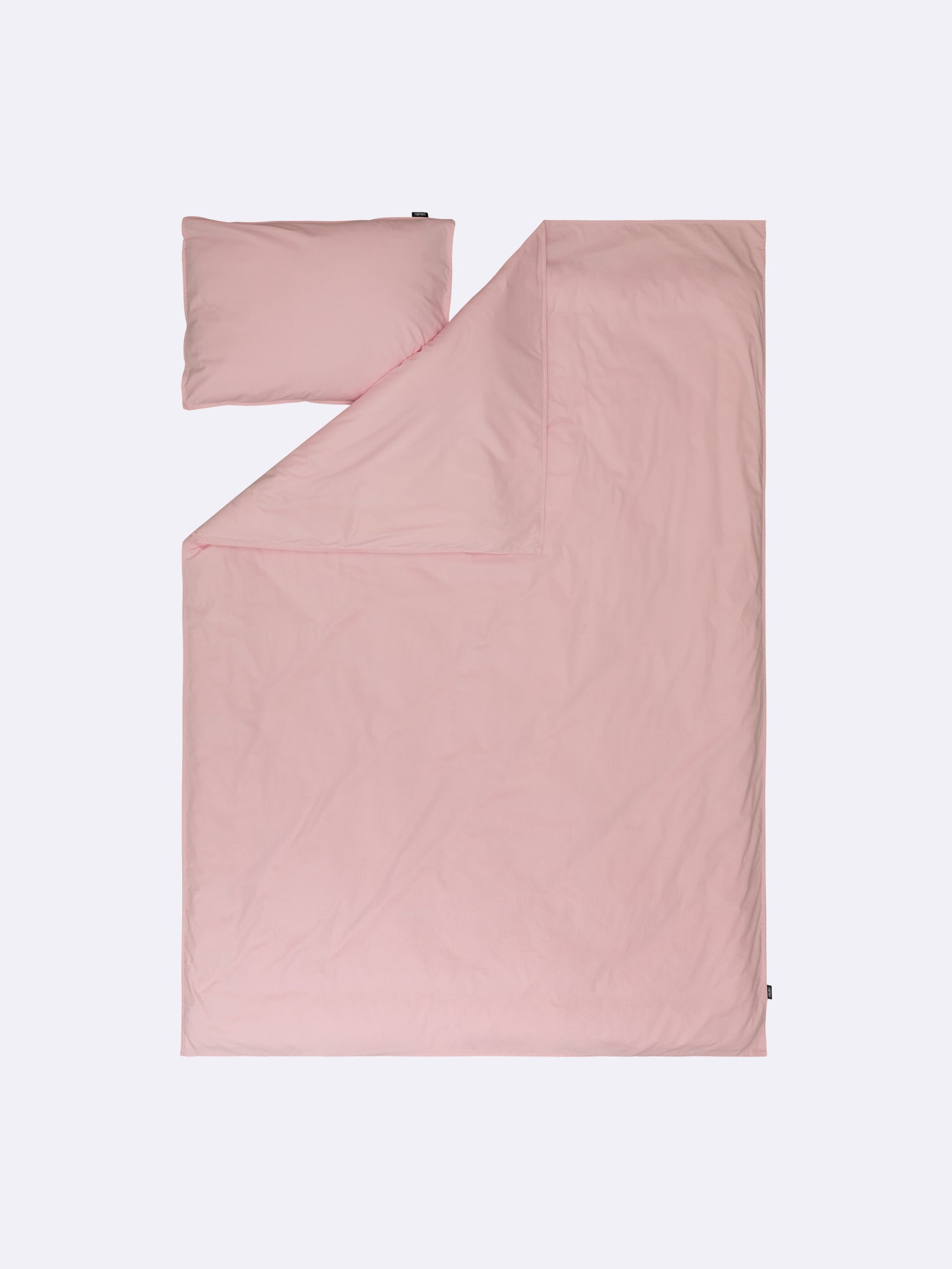 Nanso home's UNI duvet cover in pink open.