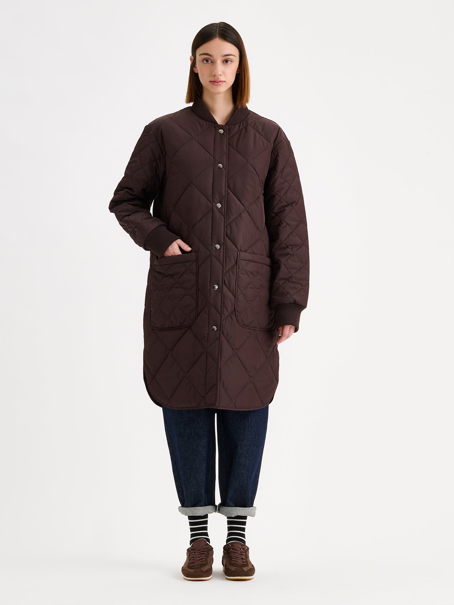 Nanso women's casual Midi quilted coat in brown on a brunette model with  blue jeans