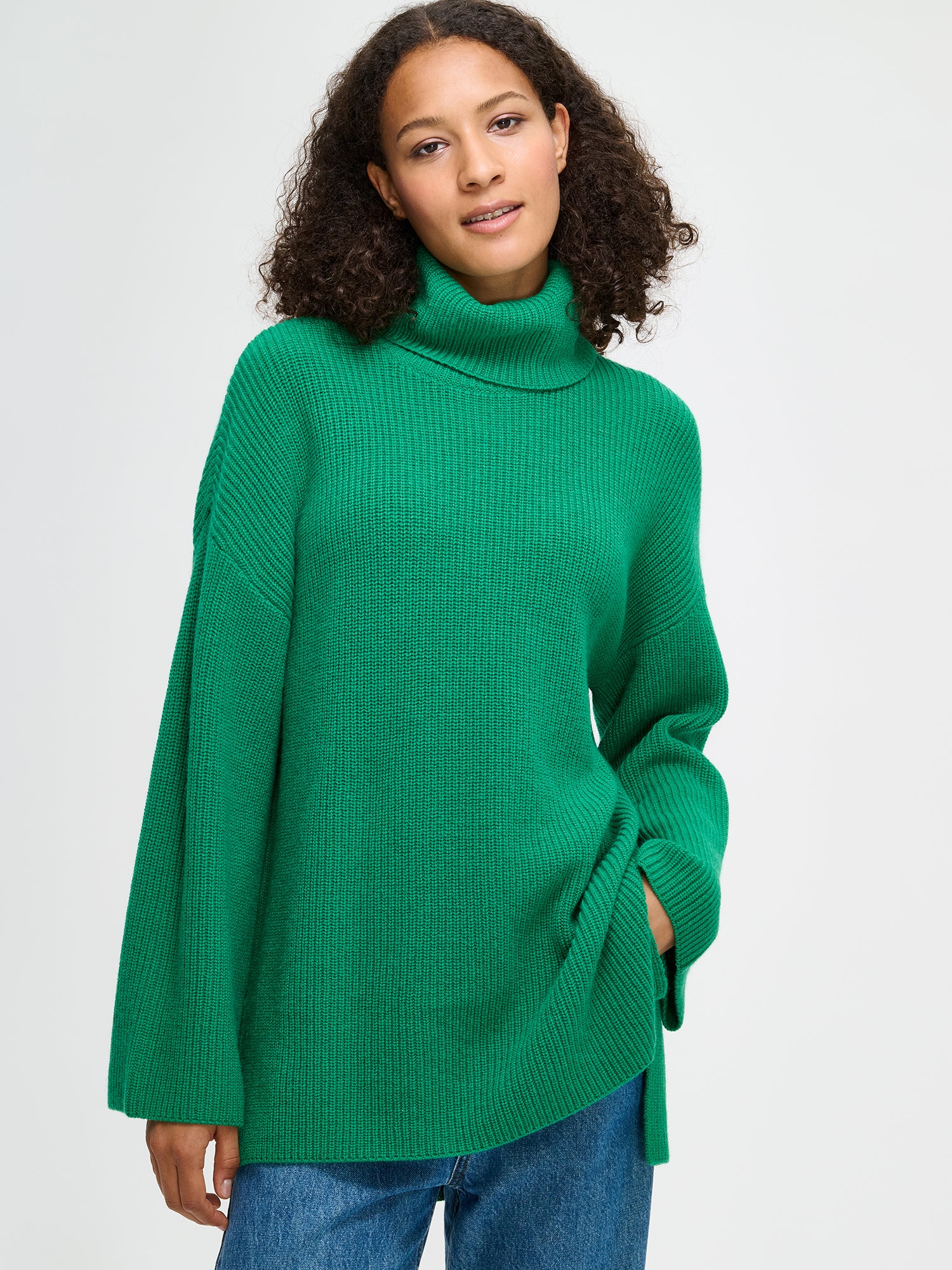 Nanso's relaxed green Pamela knit tunic, close-up