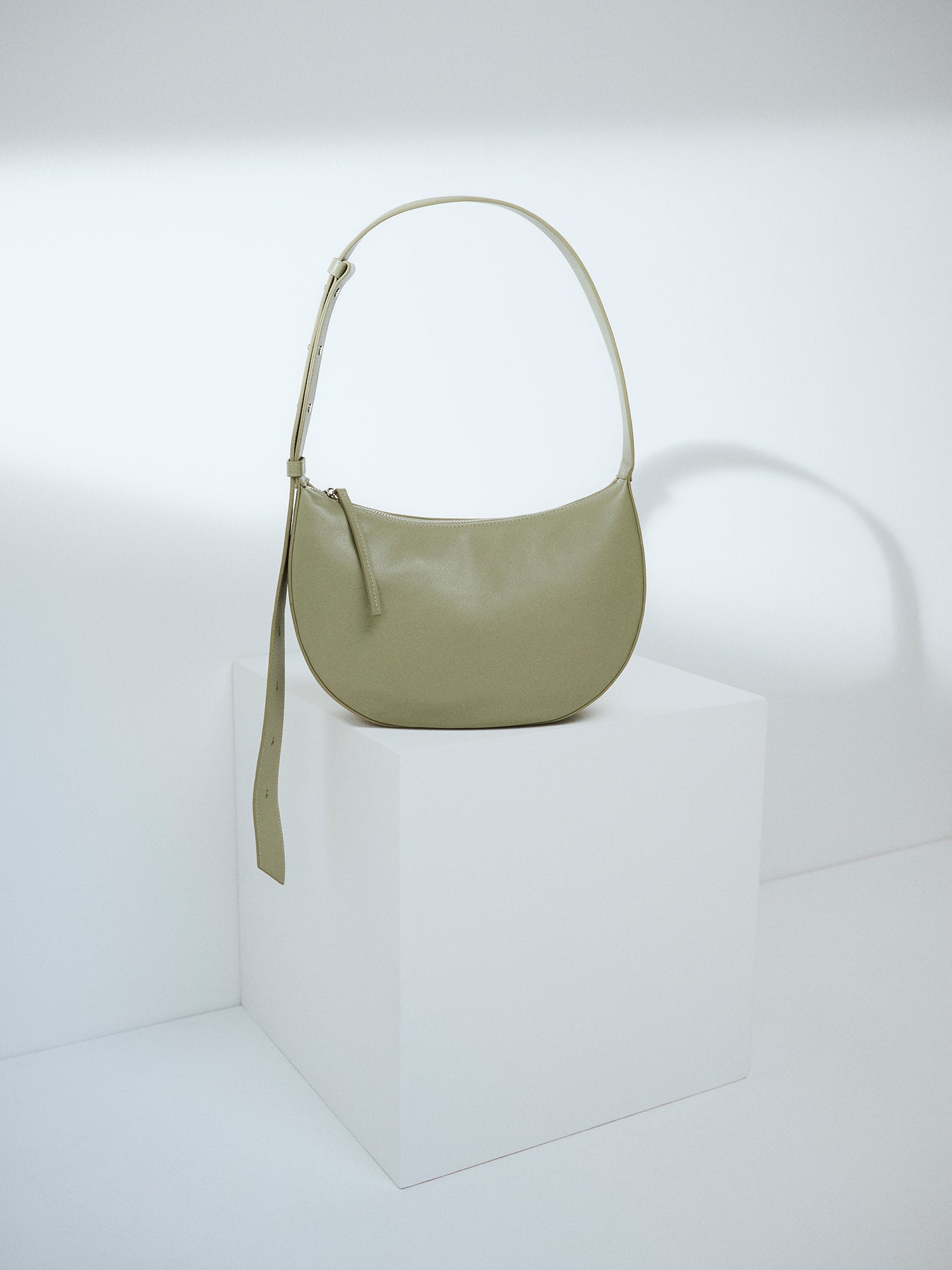 OLKA KUU Half Moon Shaped Leather Shoulder Bag - Light Green | Nanso