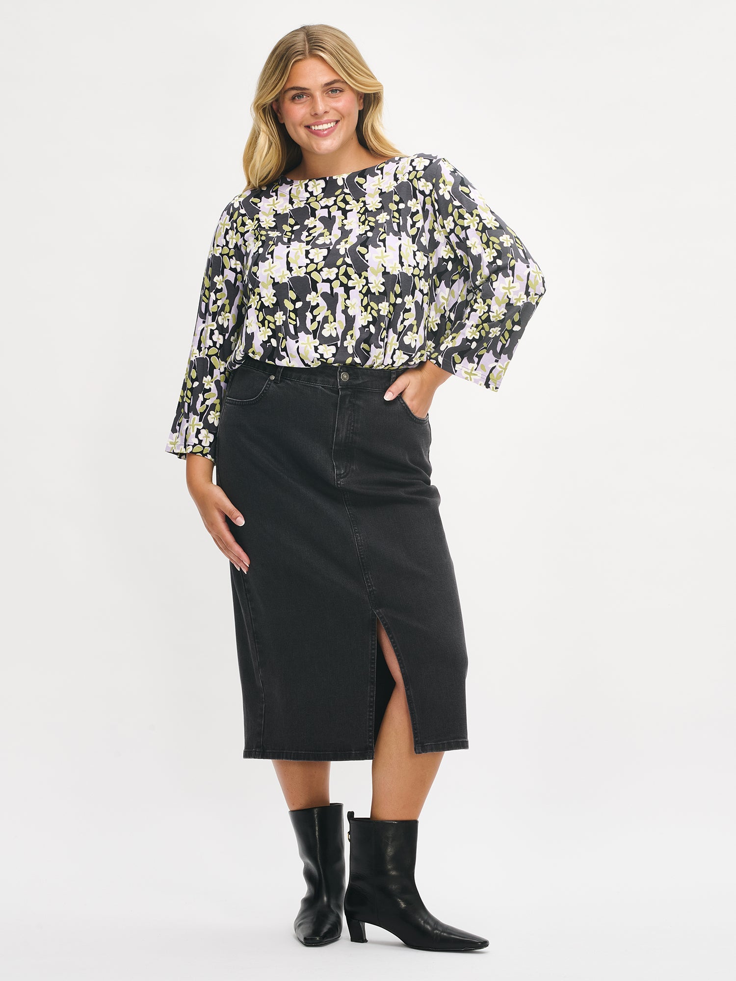 Nanso women’s patterned grey Bootsit blouse with dark grey denim skirt from the front