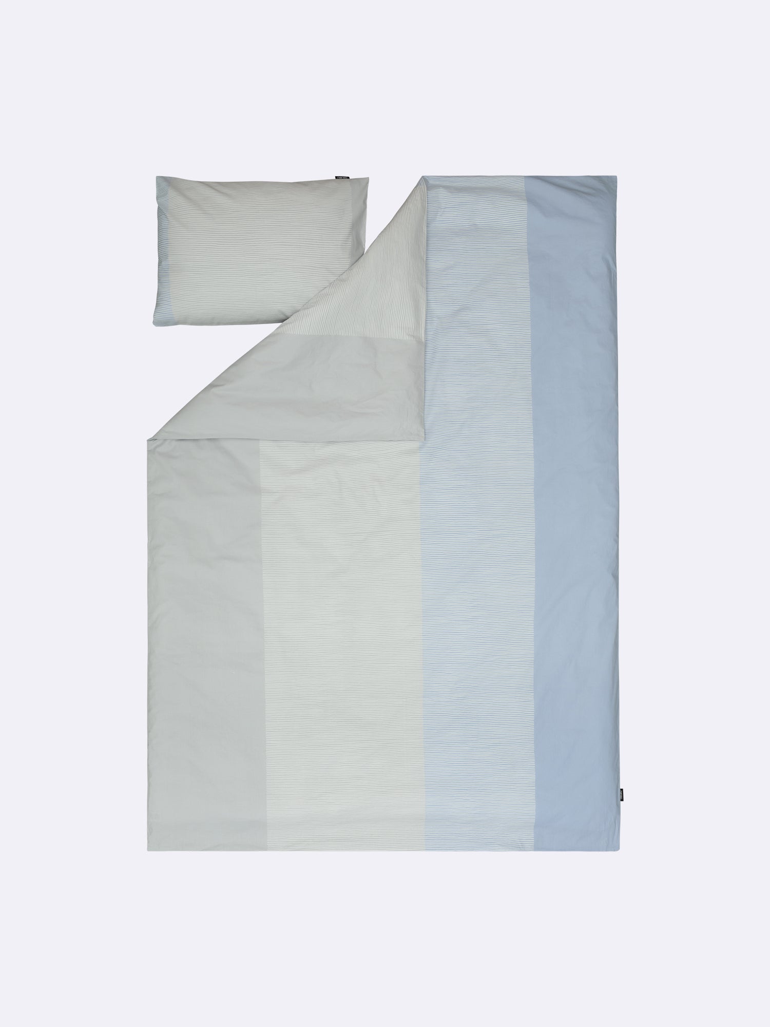 Nanso home's Viiru duvet cover set in light blue, open.