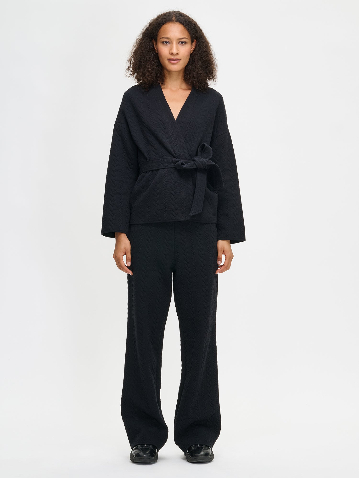 Nanso women's black Letti cardigan features a detachable belt and long sleeves, front