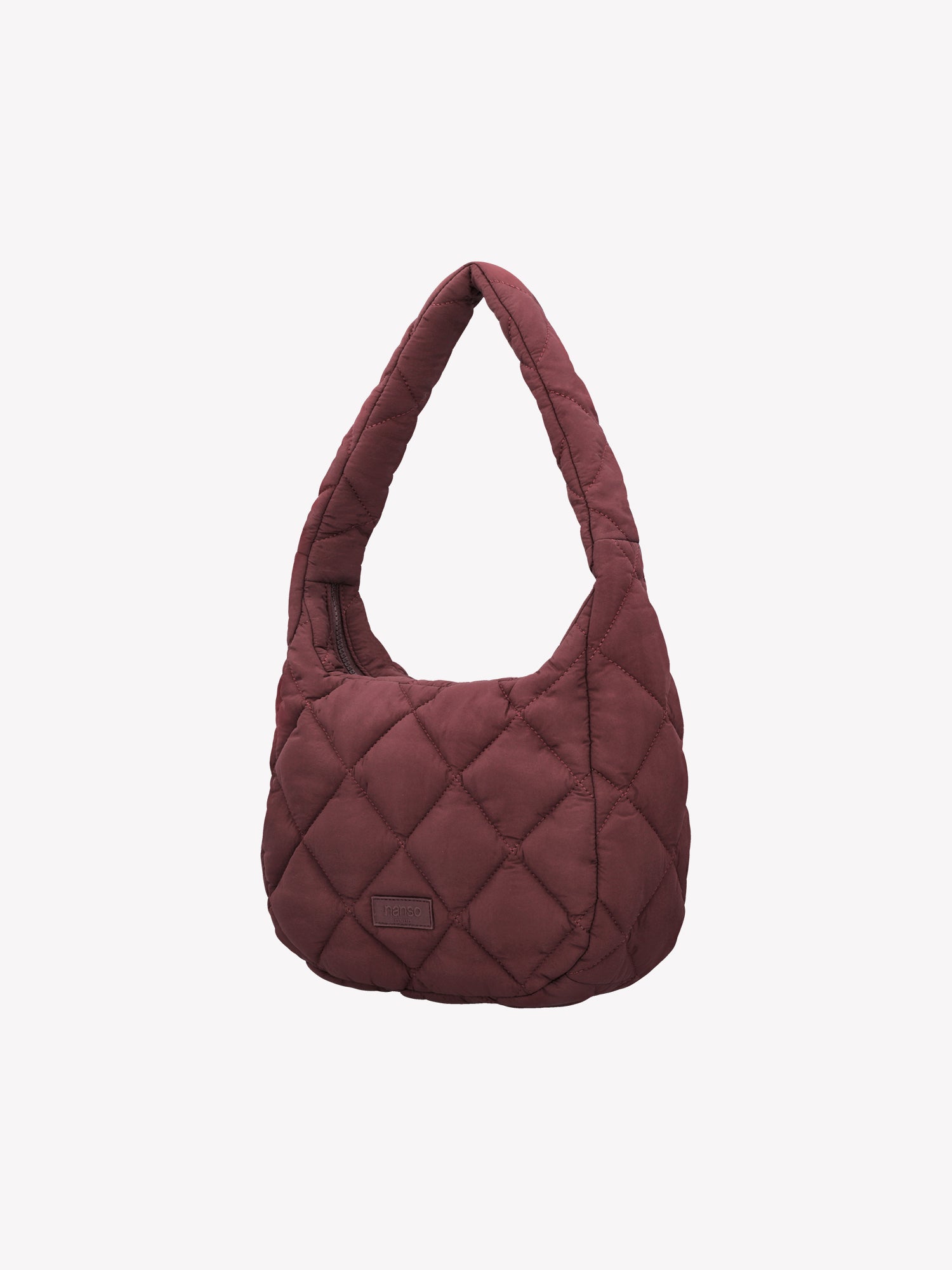 Nanso's trendy winered Midi Vanu bag is crafted from quilted fabric with a thin padding and an elegant stitched pattern on the exterior, product picture