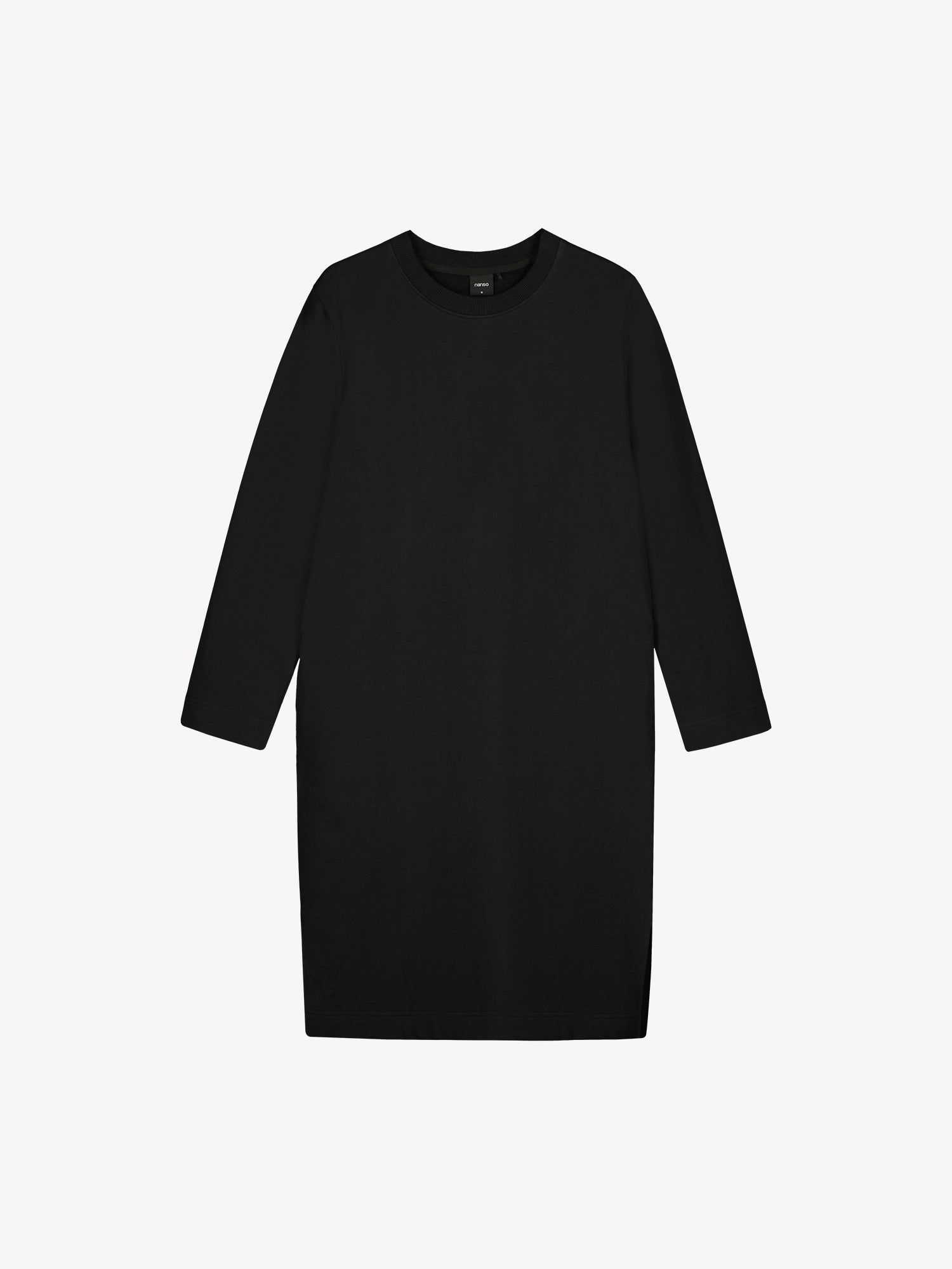 Black Koto dress with long sleeves in a product picture.