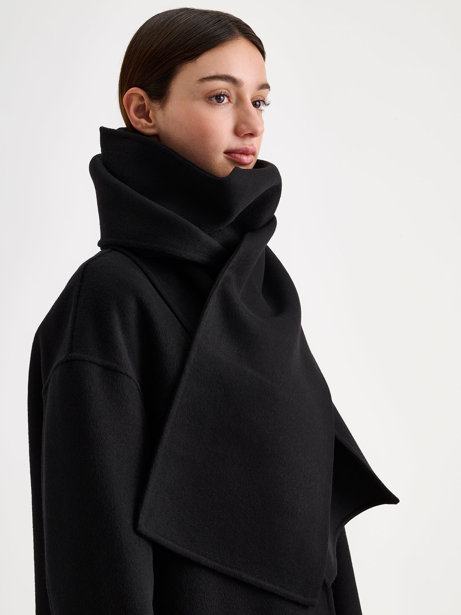 Nanso women's elegant black Elli wool scarf on a model