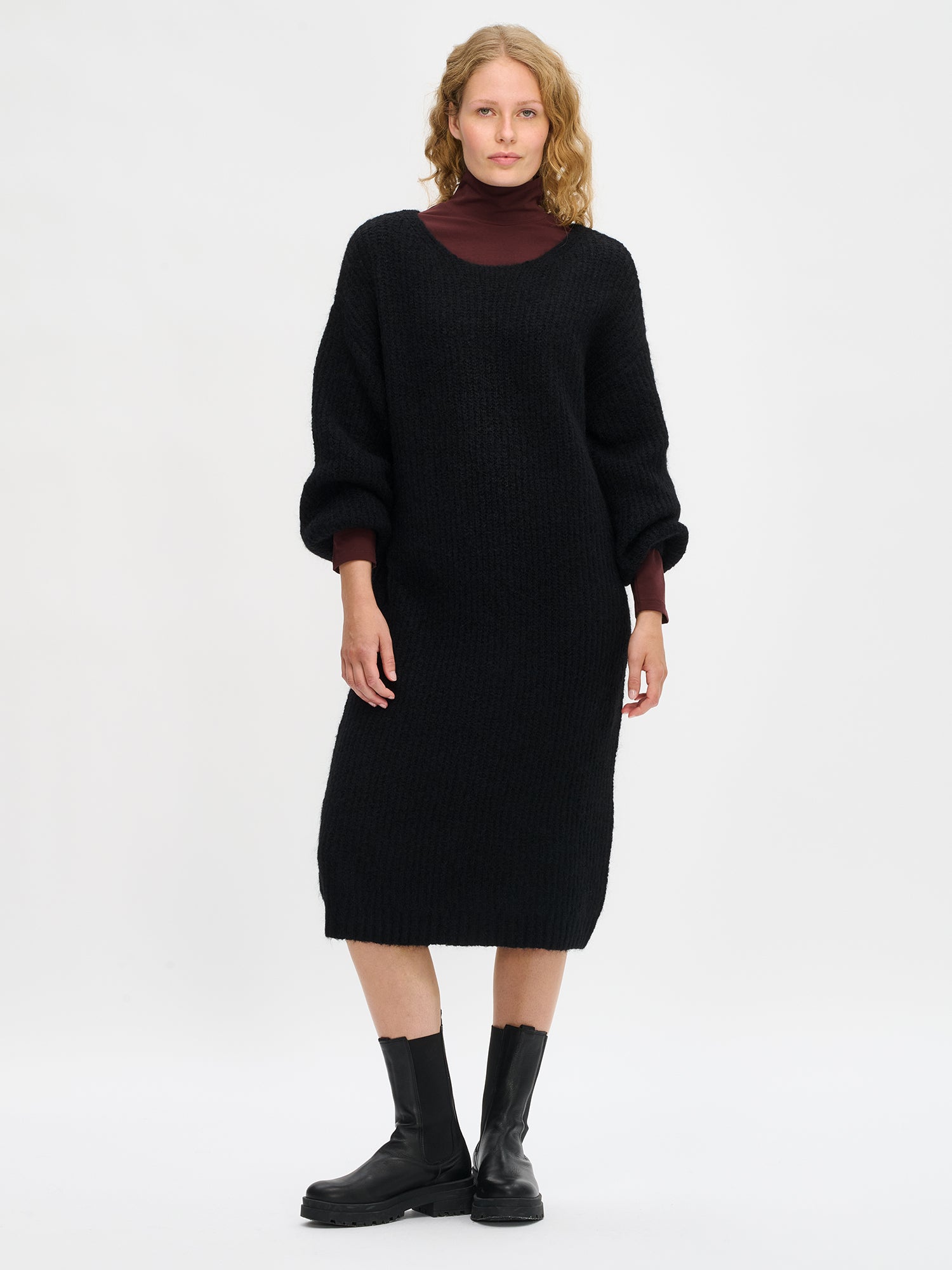Nanso's luxurious black Karamelli knit dress, front