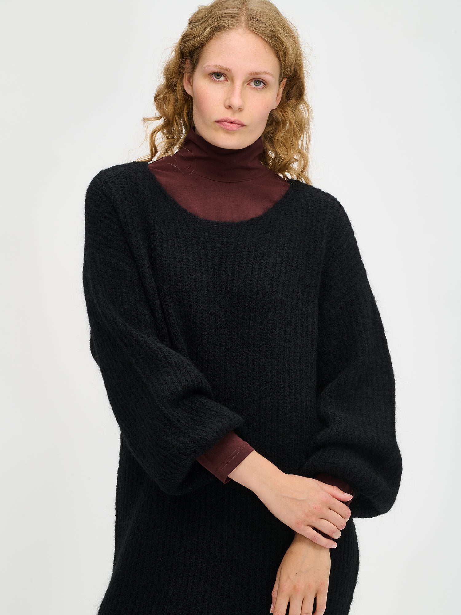 Nanso's luxurious black Karamelli knit dress front