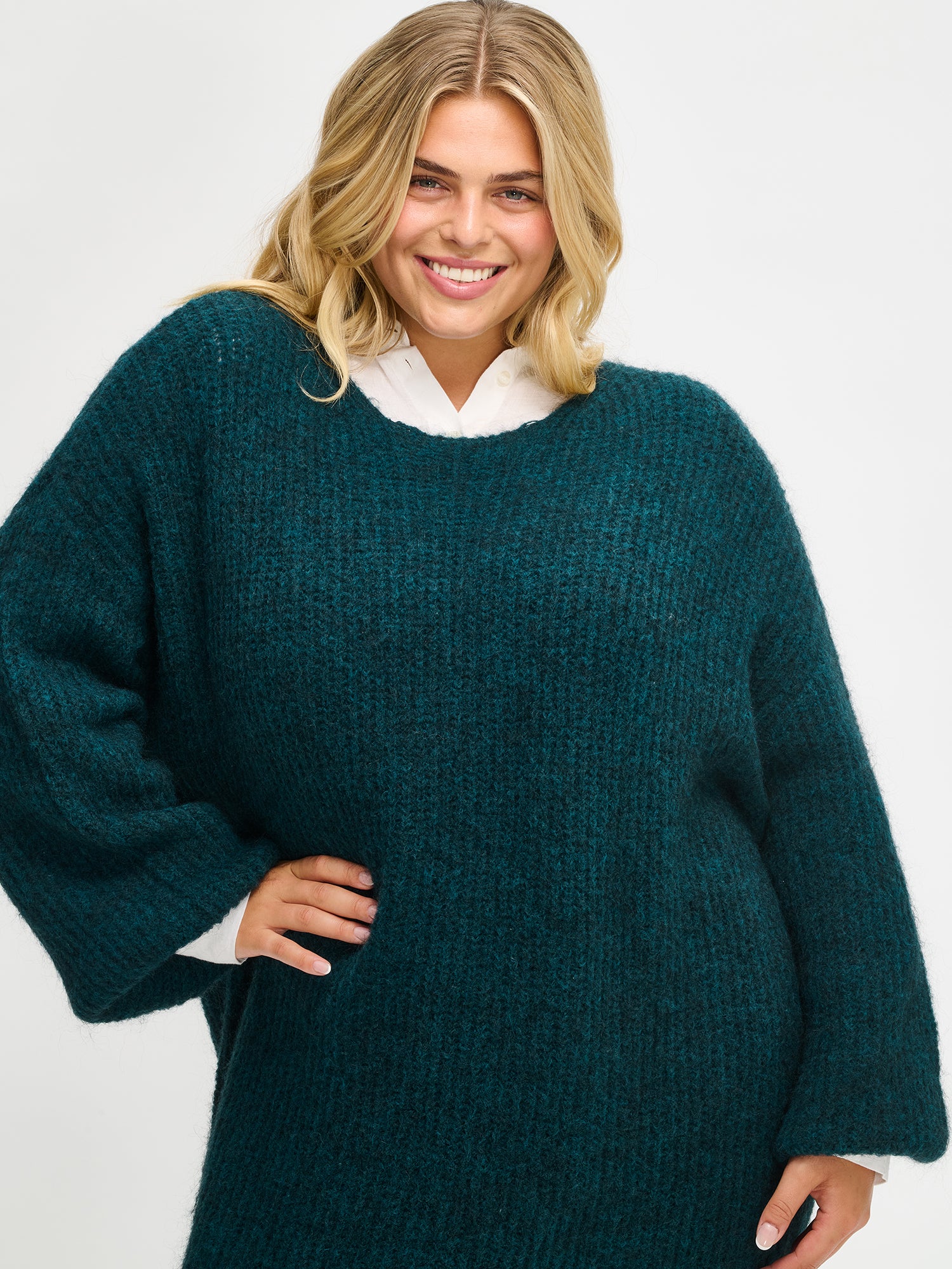 Nanso's luxurious green Karamelli knit dress, front