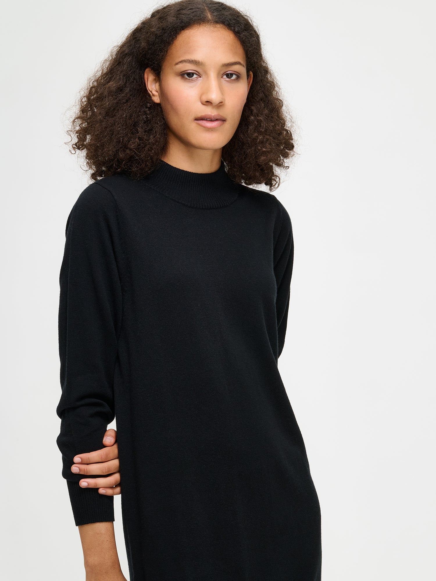 Nanso Villis dress for women features black colour and a straight-cut knit design with a stand-up collar and long sleeves, close-up