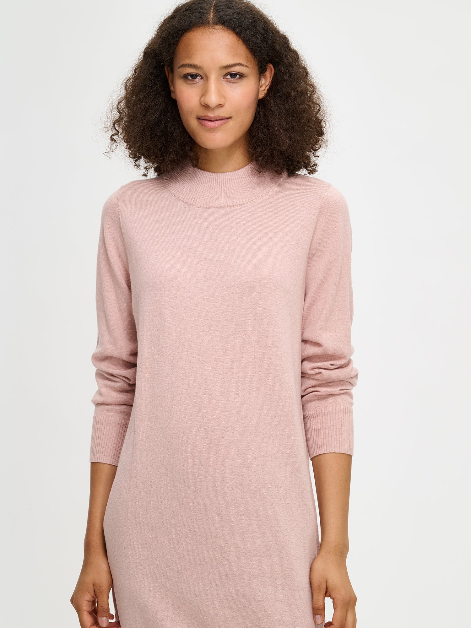 Nanso Villis dress for women features pink colour and a straight-cut knit design with a stand-up collar and long sleeves, close-up