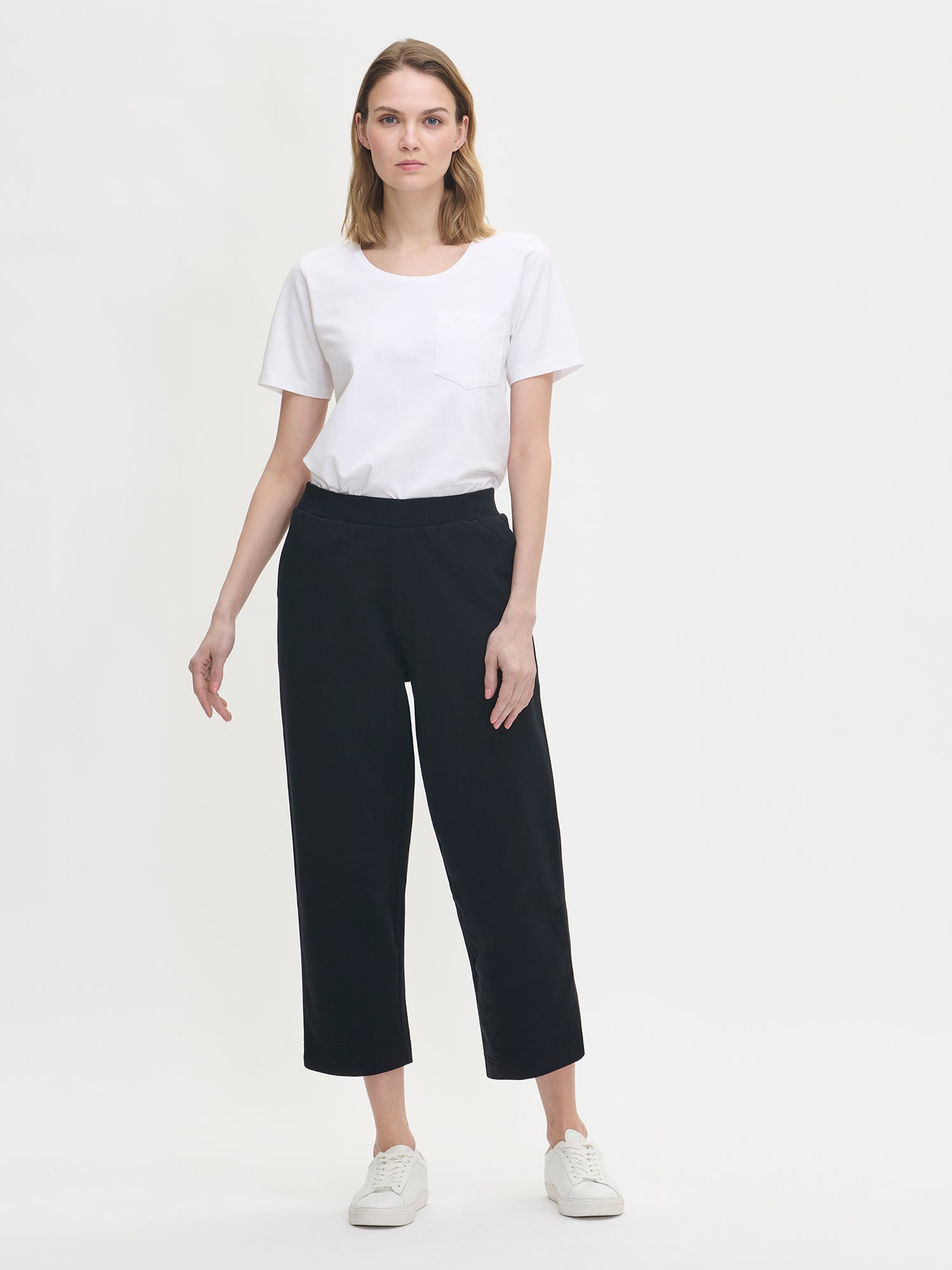 Women's Koto culottes in black with pockets on a model.