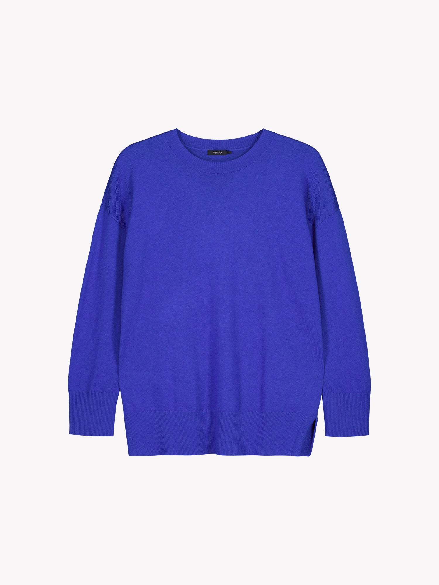 The VILLIS Long Knit Sweater in blue features a timeless boxy silhouette and a classic crew neckline, dropped shoulders, and full-length sleeves and ribbed trim at the hem and cuffs. Product picture from the front.