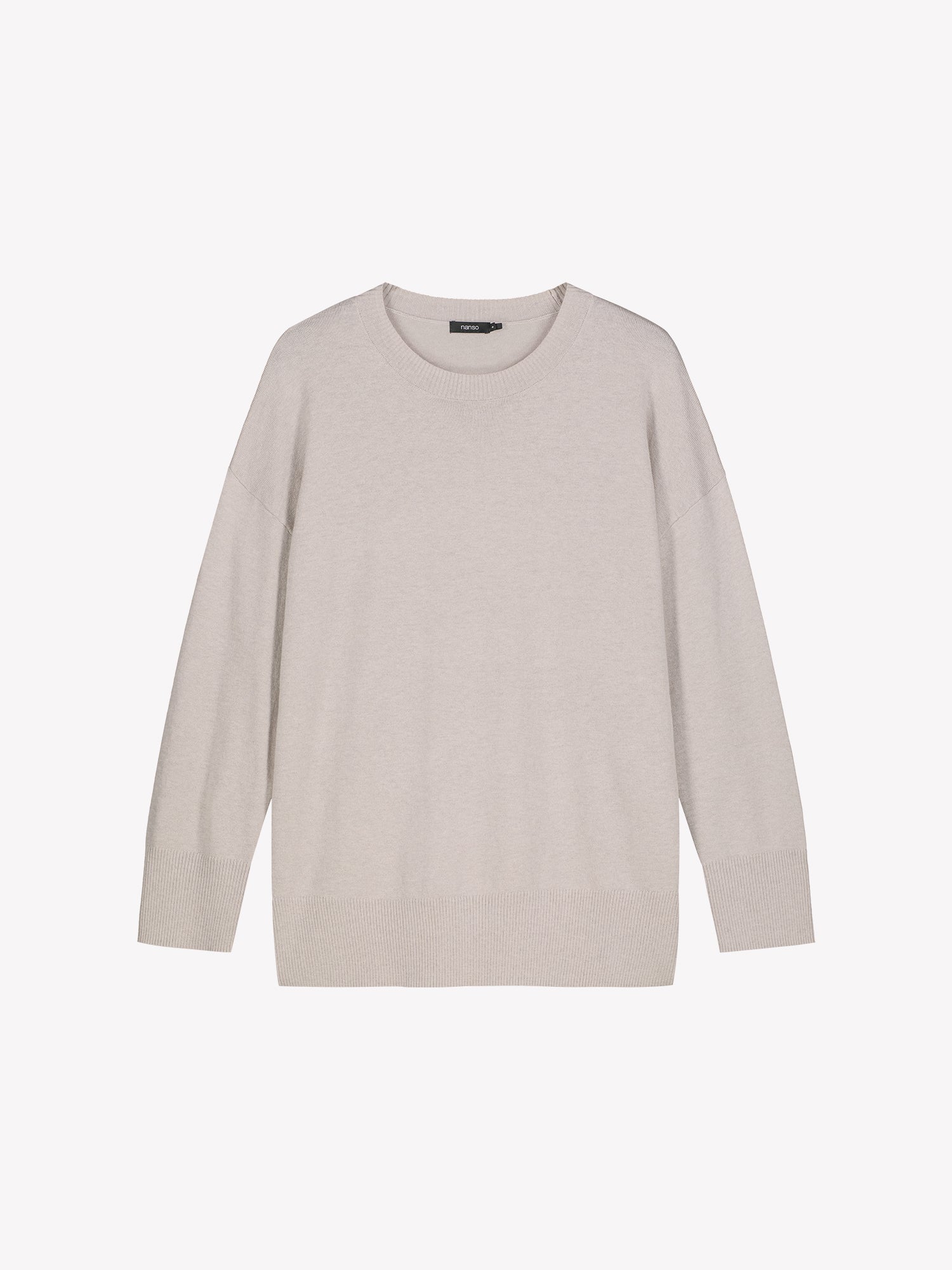 The VILLIS Long Knit Sweater in greige features a timeless boxy silhouette and a classic crew neckline, dropped shoulders, and full-length sleeves and ribbed trim at the hem and cuffs. Product picture from the front.