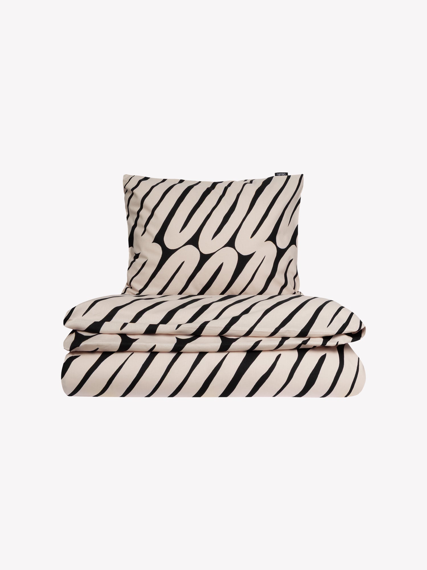 Nanso home's LASKOS duvet cover in beige and black with a graphic design closed in a product picture.