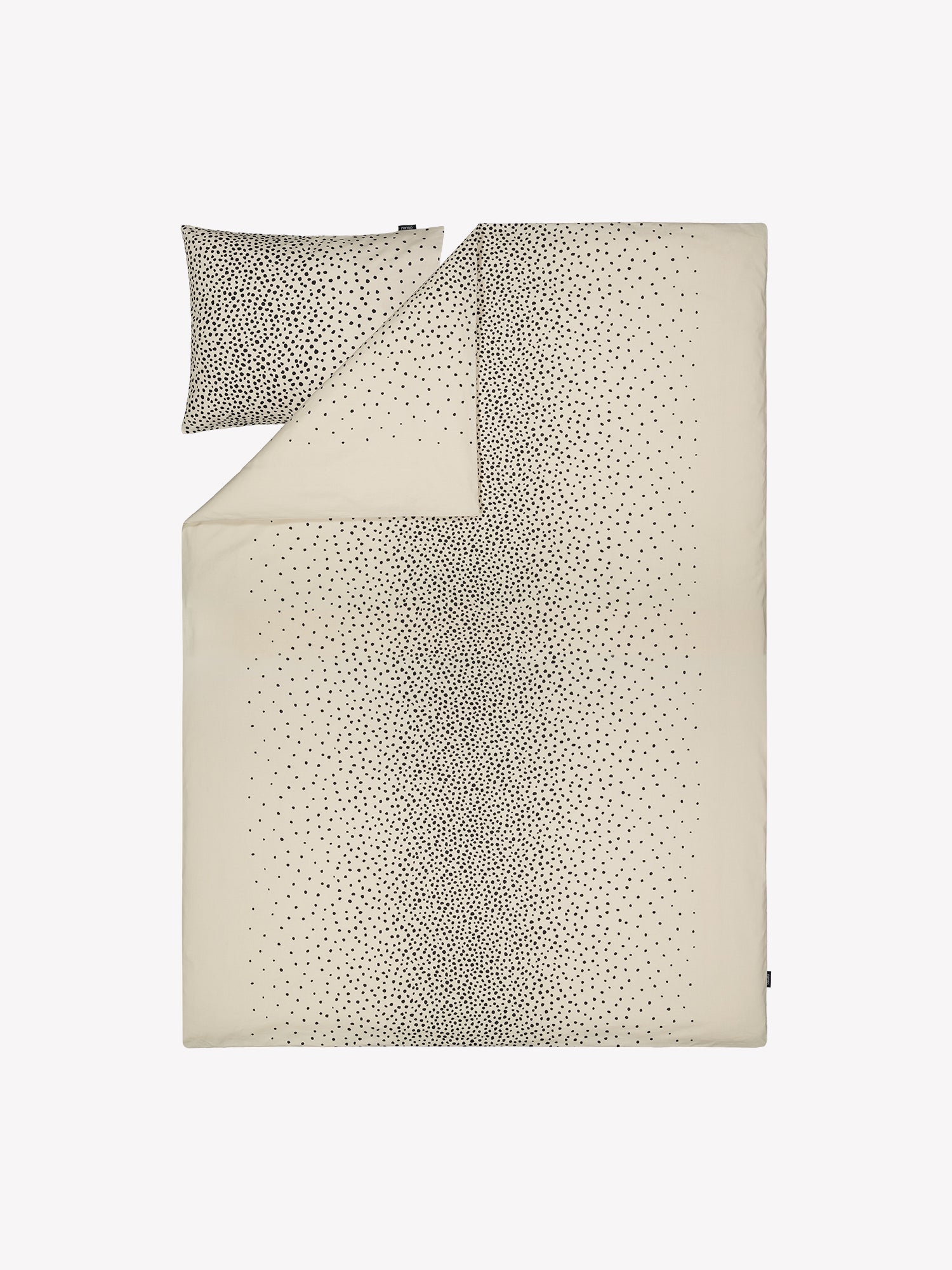 Täplä duvet cover set in beige with charming dots, in a product picture