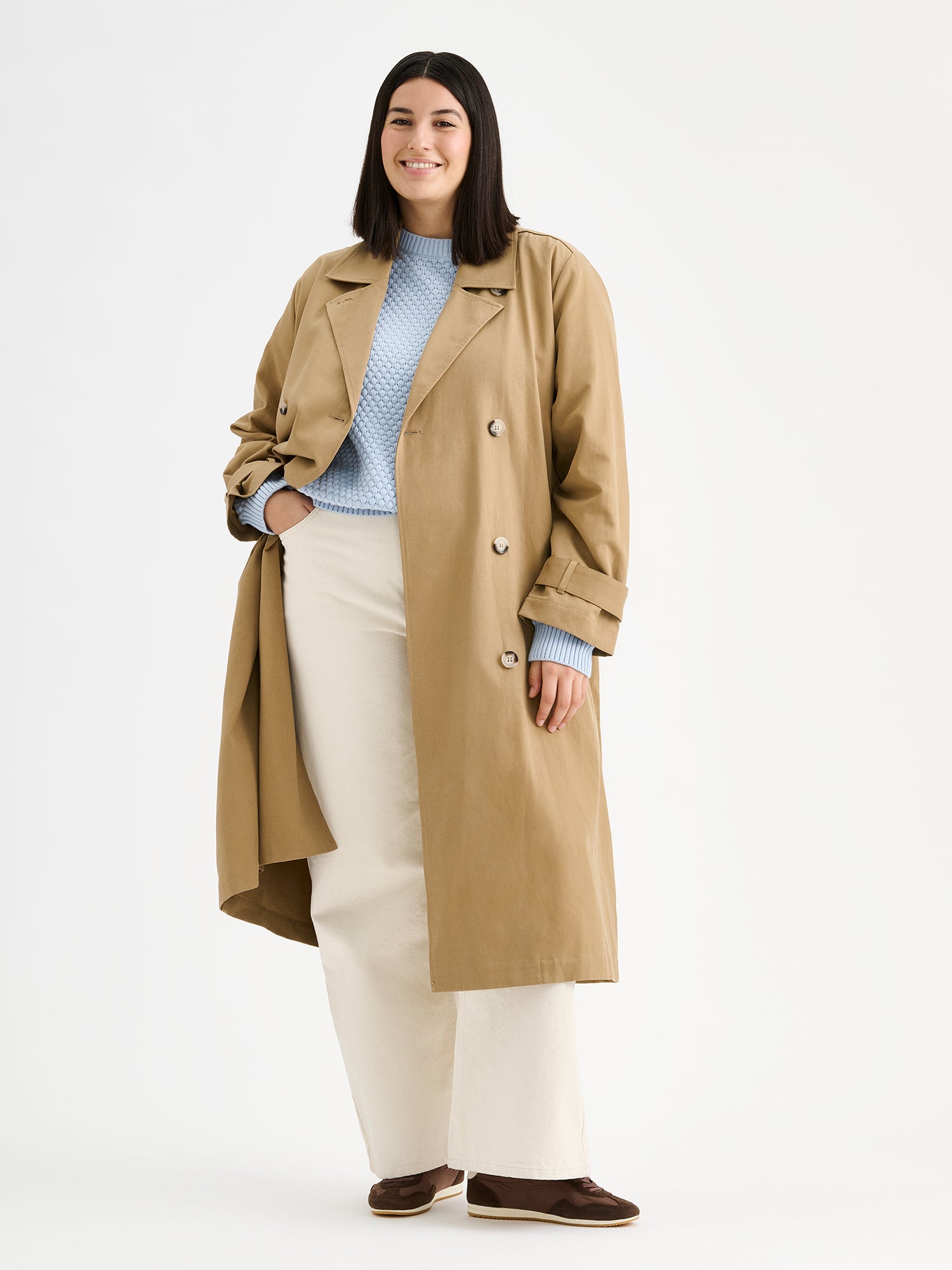 Nanso women's Klaara trench coat in brown on a model, opened.