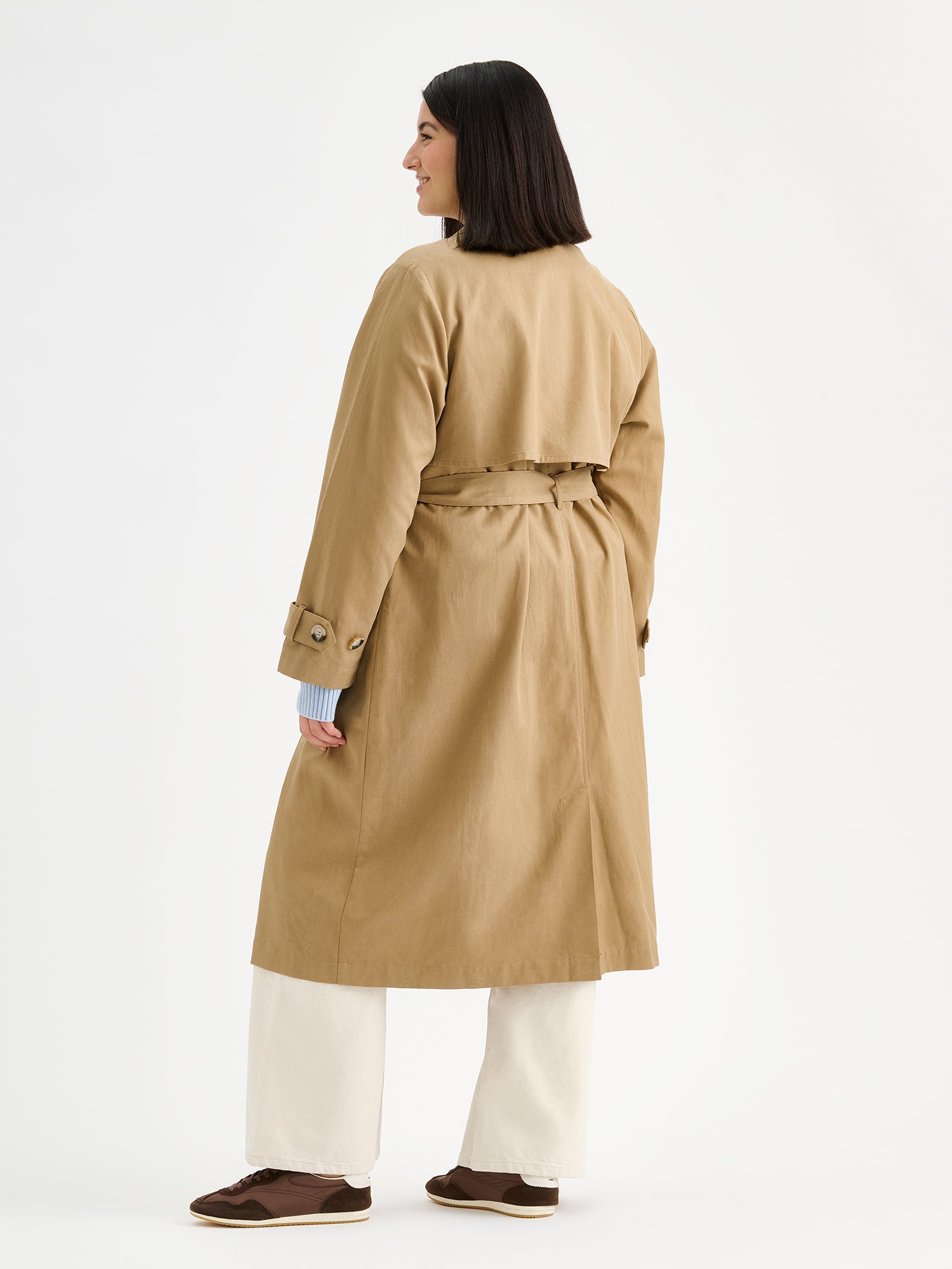 Nanso women's Klaara trench coat in brown on a model from the backside
